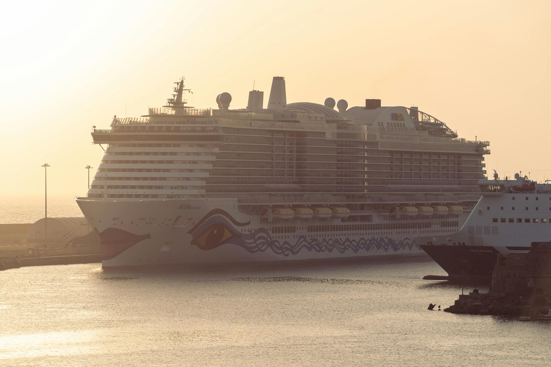 Cruise ship docked at sunset