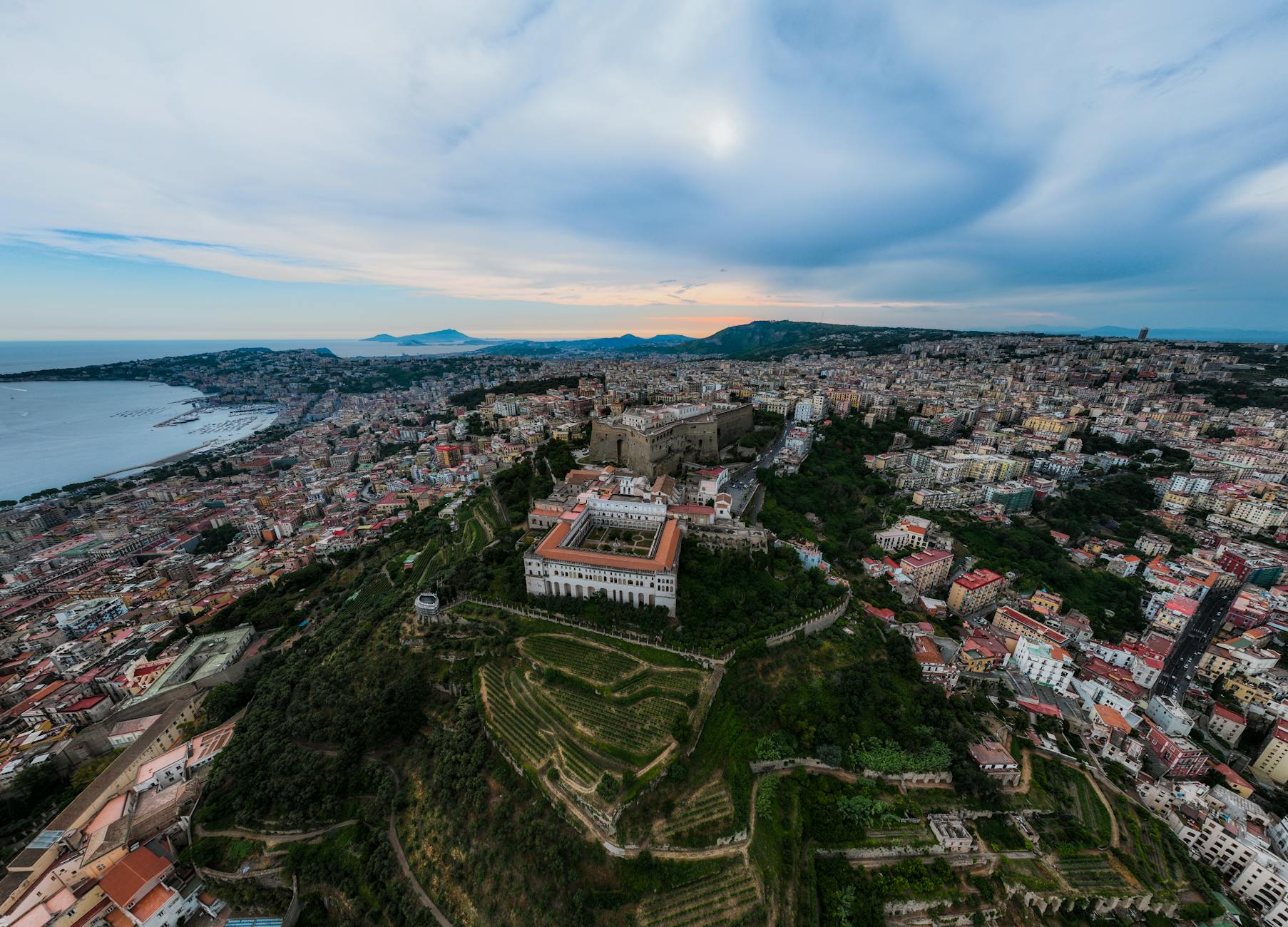 Sant'Elmo Castle and Naples cityscape at sunset