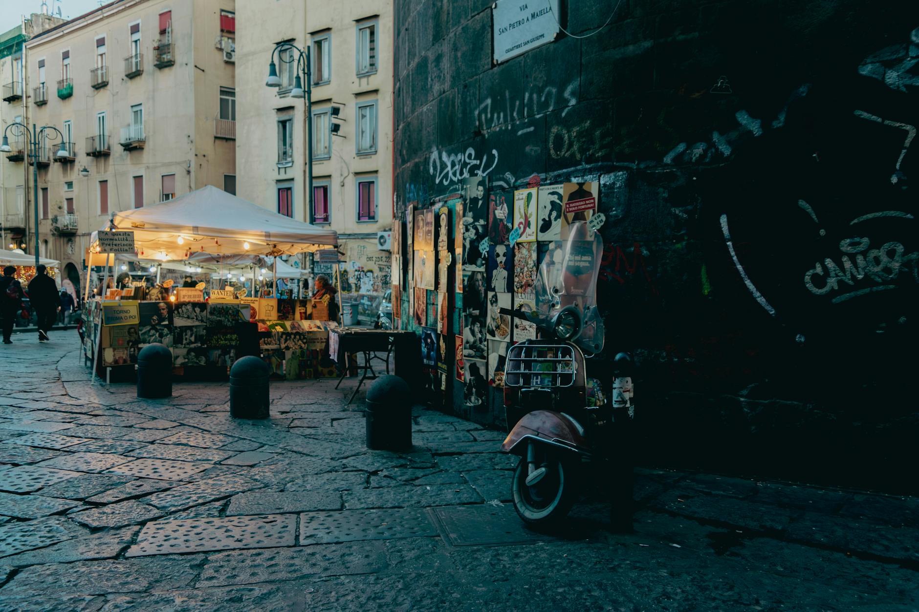 Evening street market scene in historic Naples