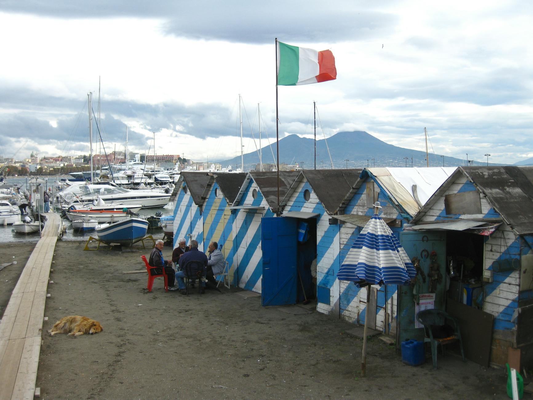 Naples seaside view with Mount Vesuvius and fishing huts