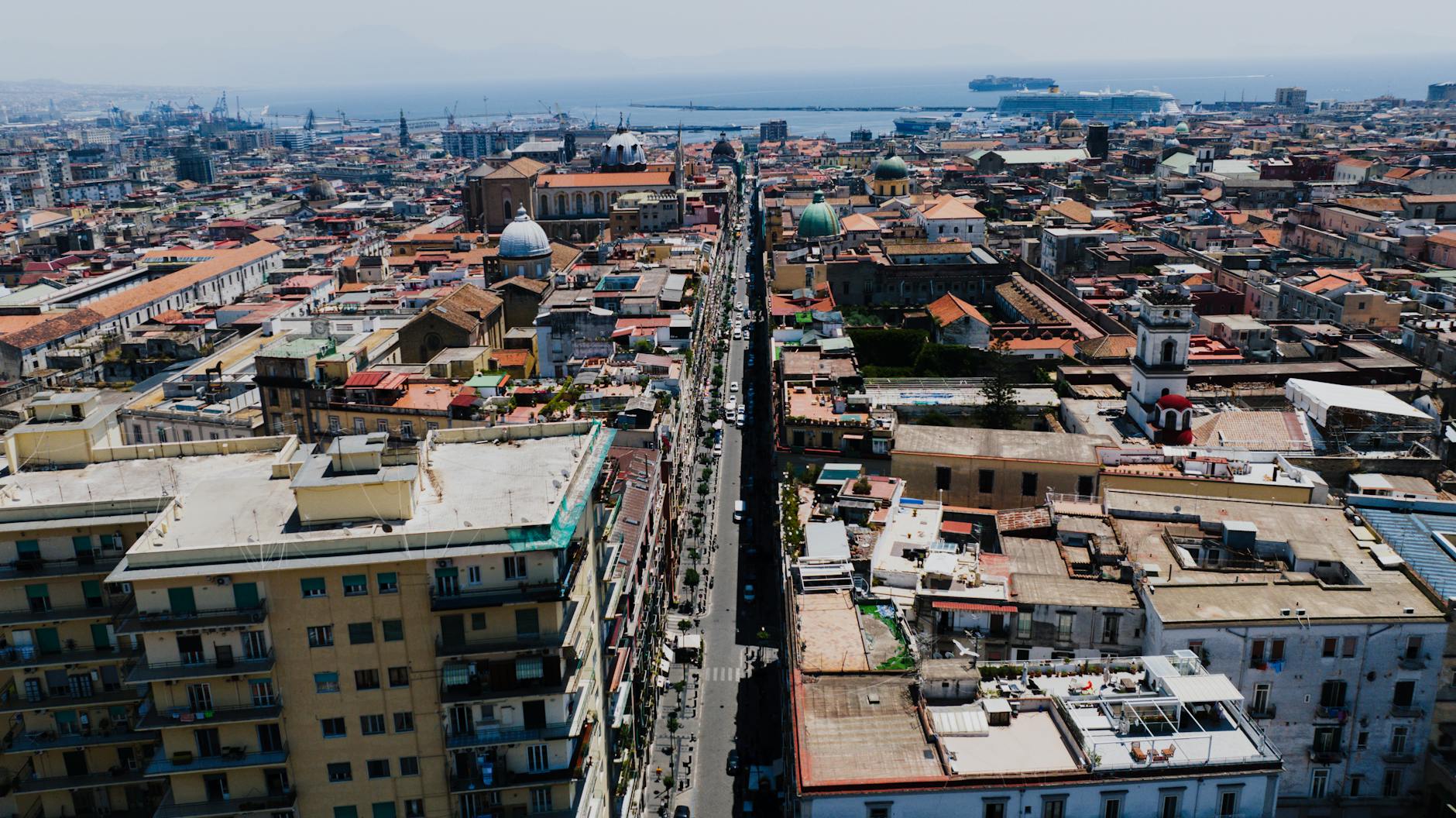 Panoramic aerial view of Naples rooftops and urban landscape