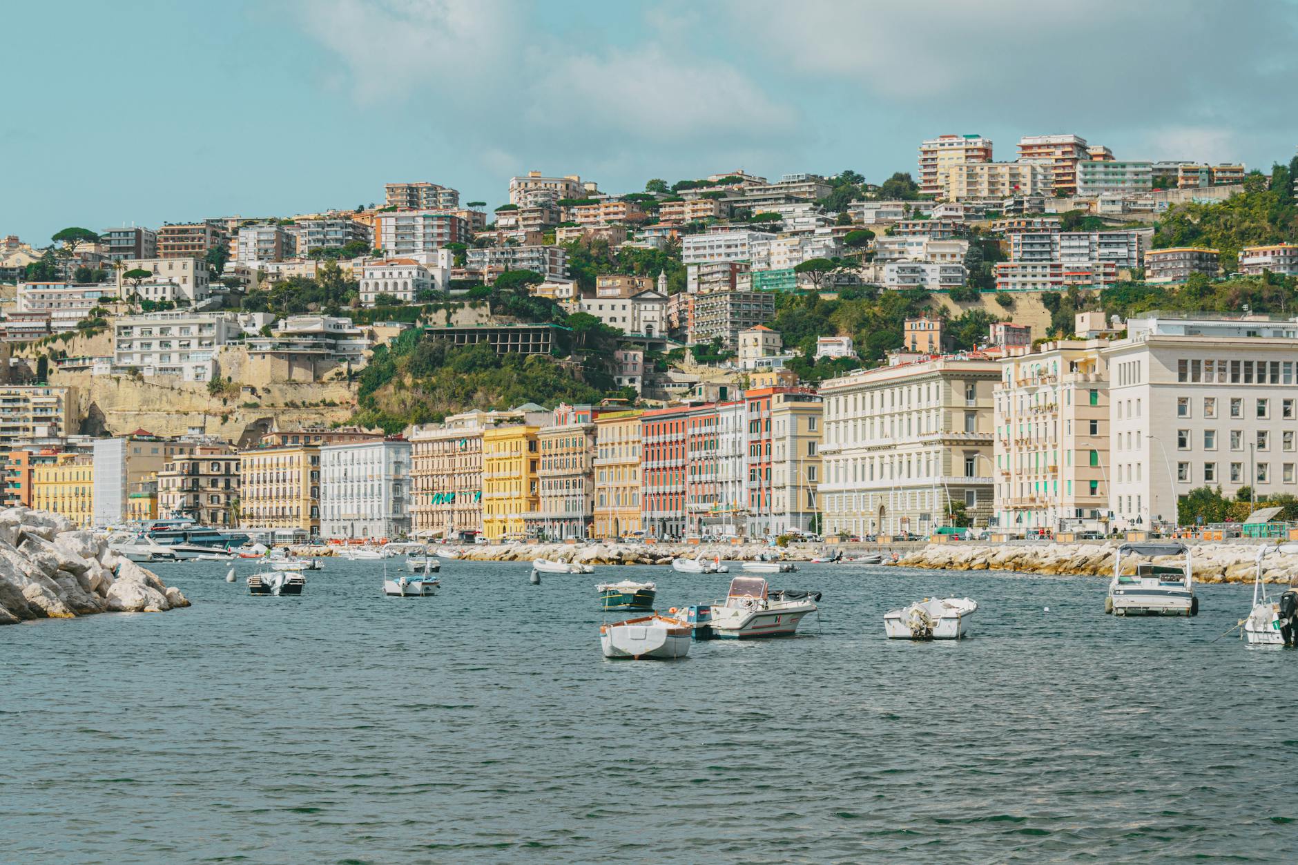 Naples harbor with boats and colorful waterfront buildings