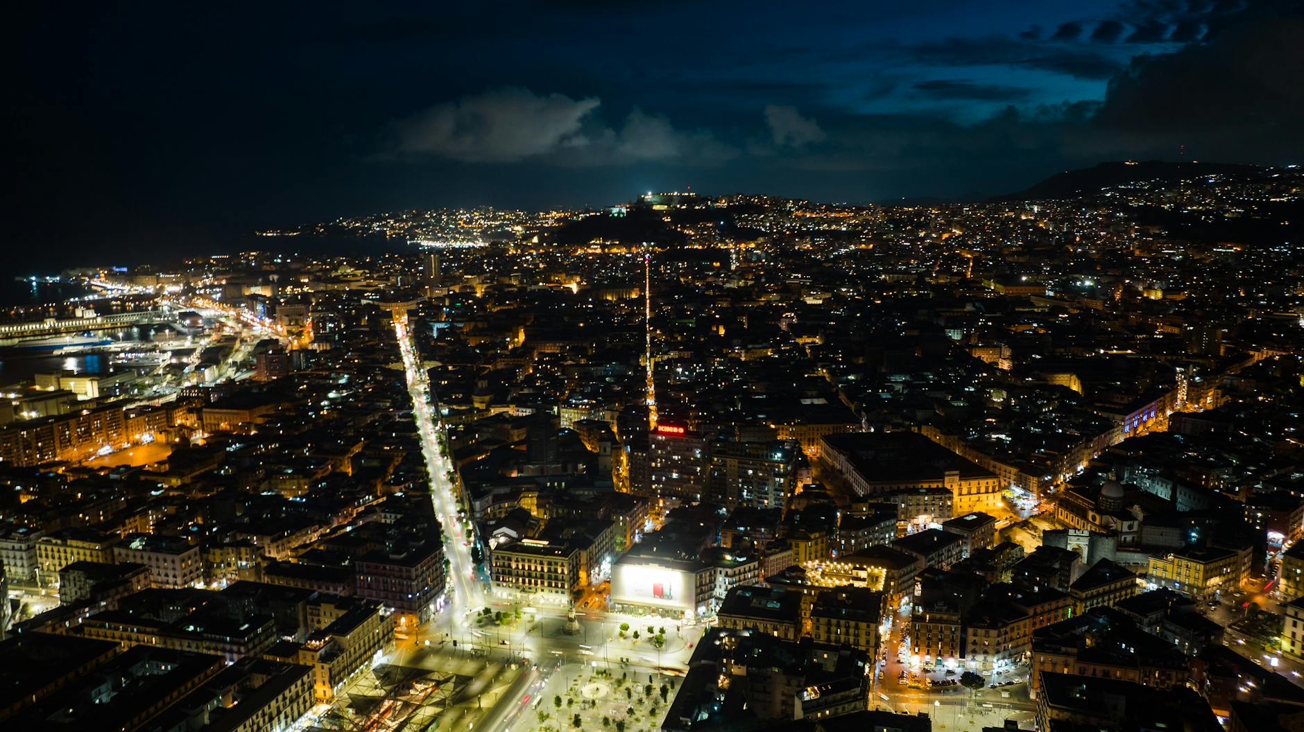 Aerial view of Naples at night with city lights