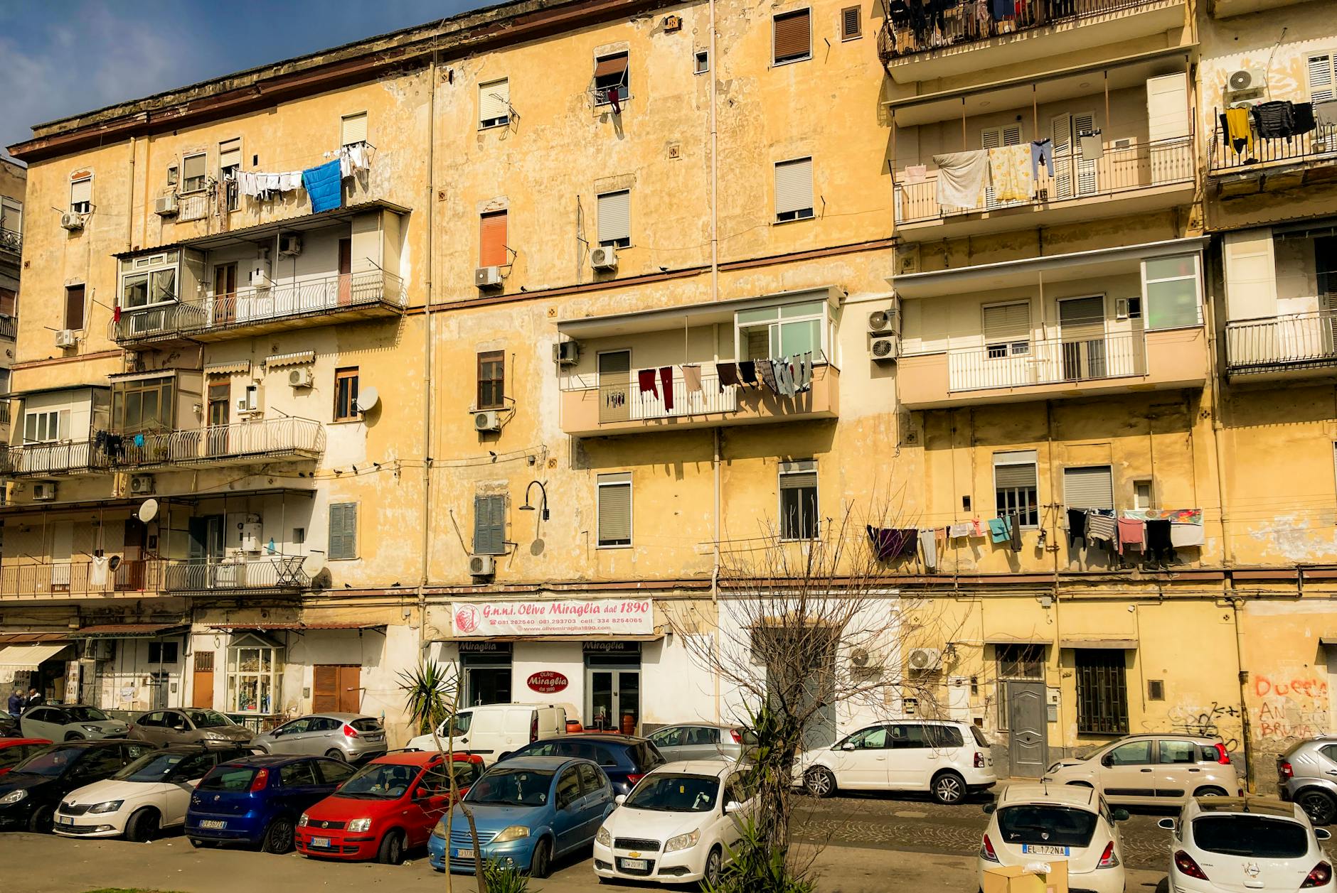 Residential building and parked cars in Naples