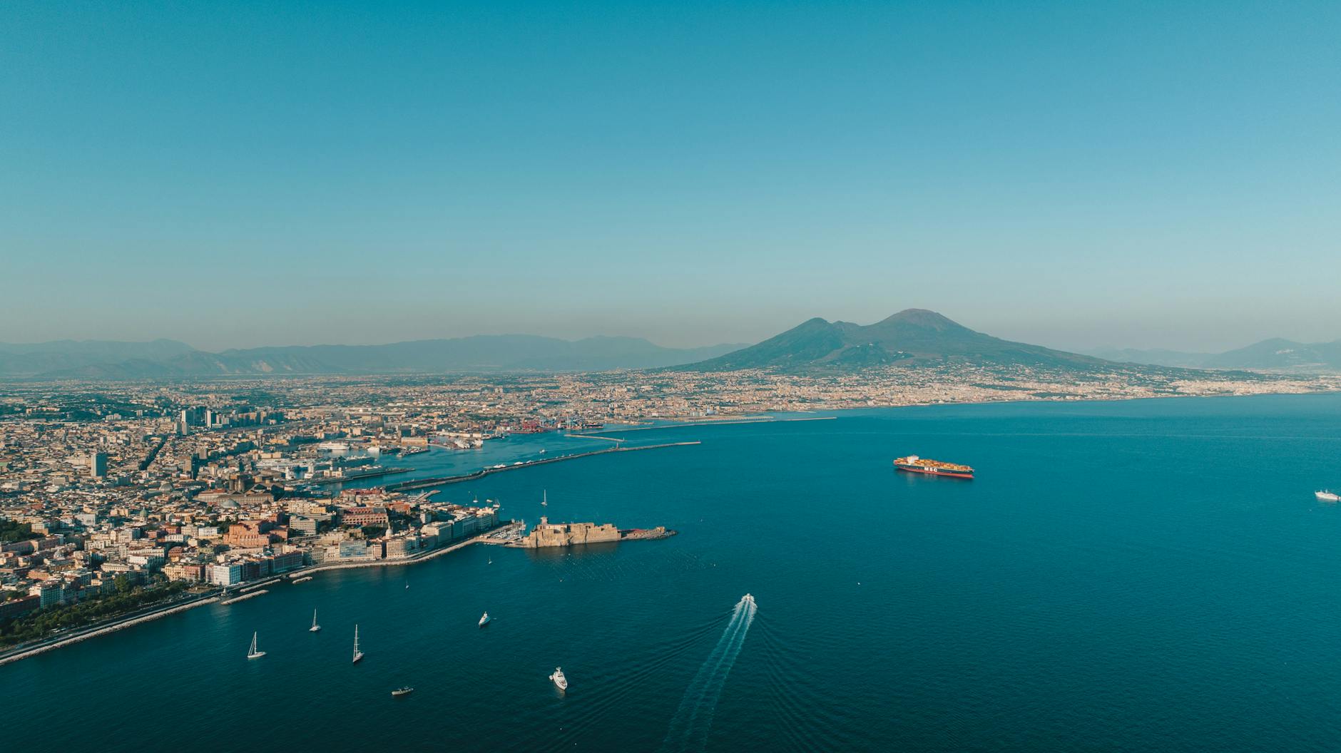 Aerial view of Naples coastline with Mount Vesuvius
