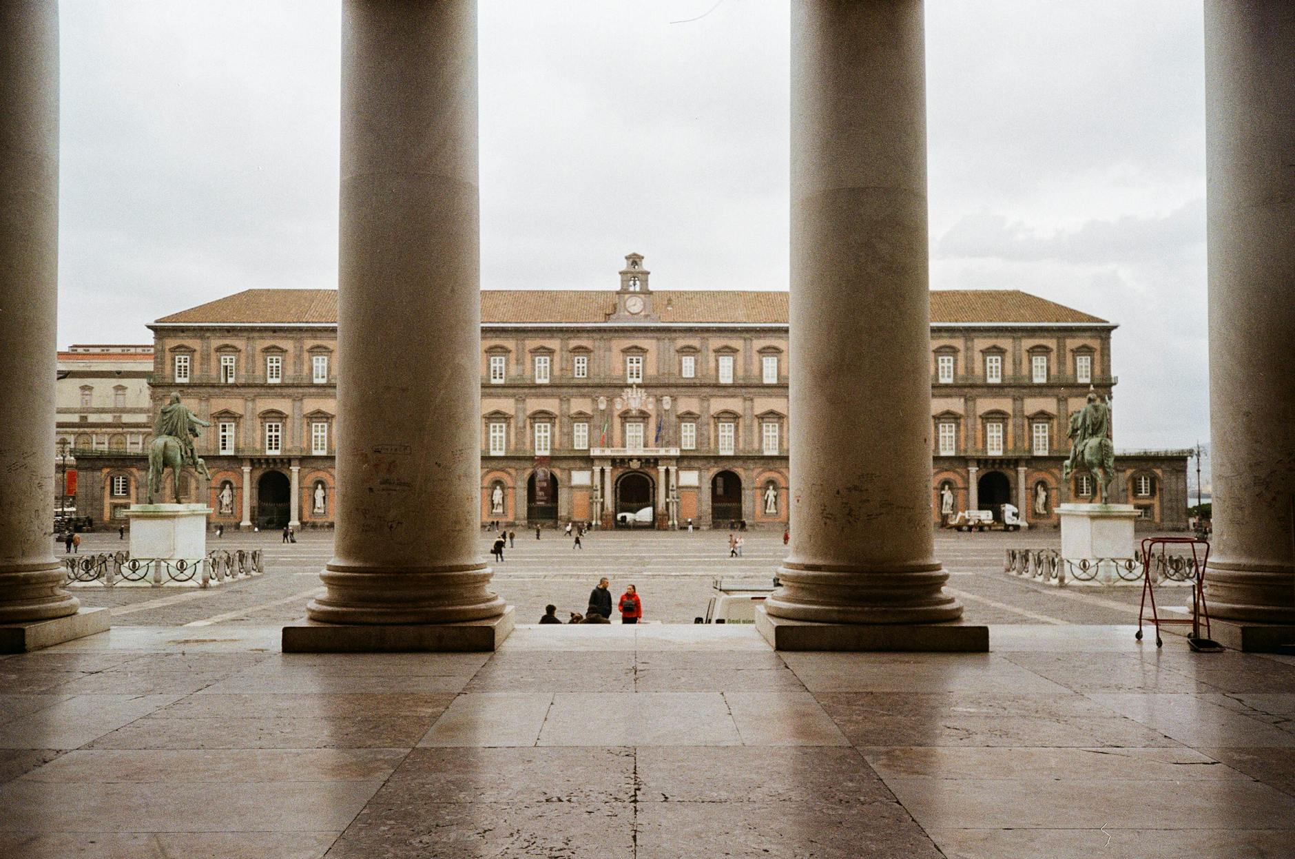 Royal Palace of Naples framed by historic columns