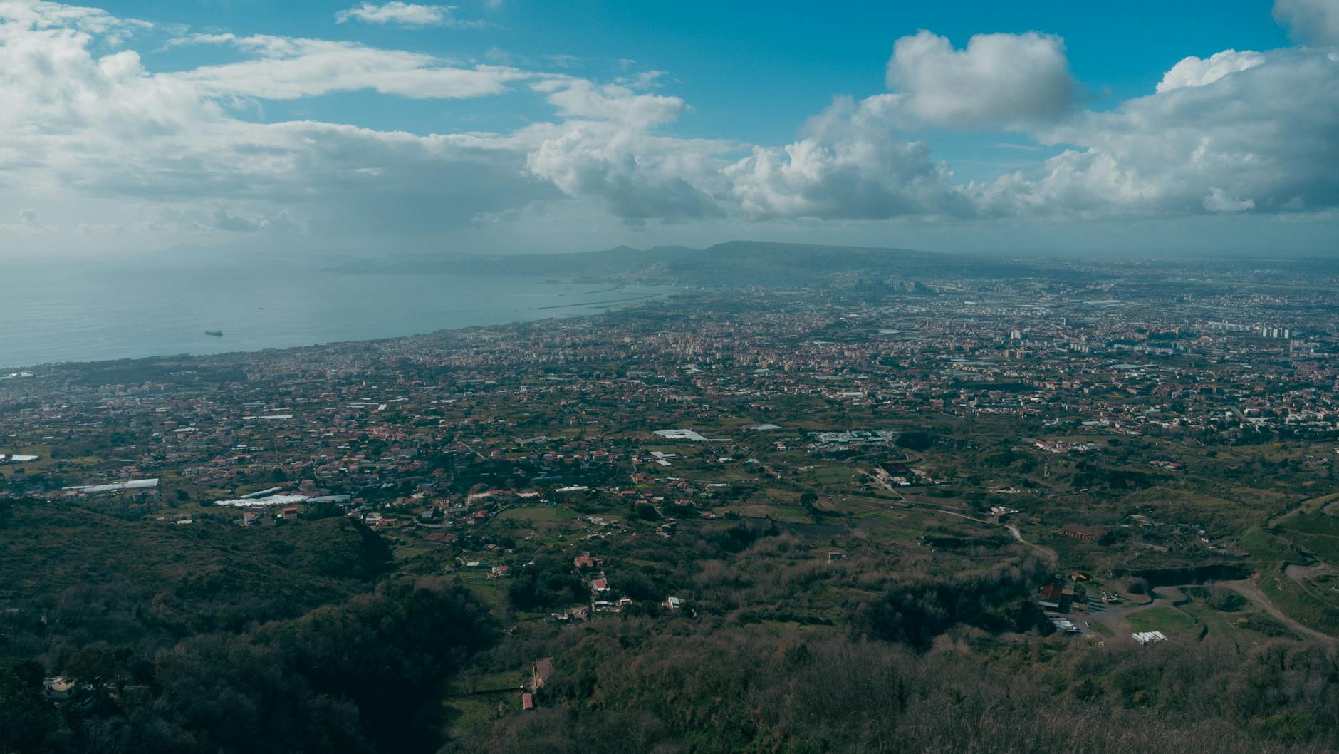 Aerial view of Naples with Mount Vesuvius in the distance