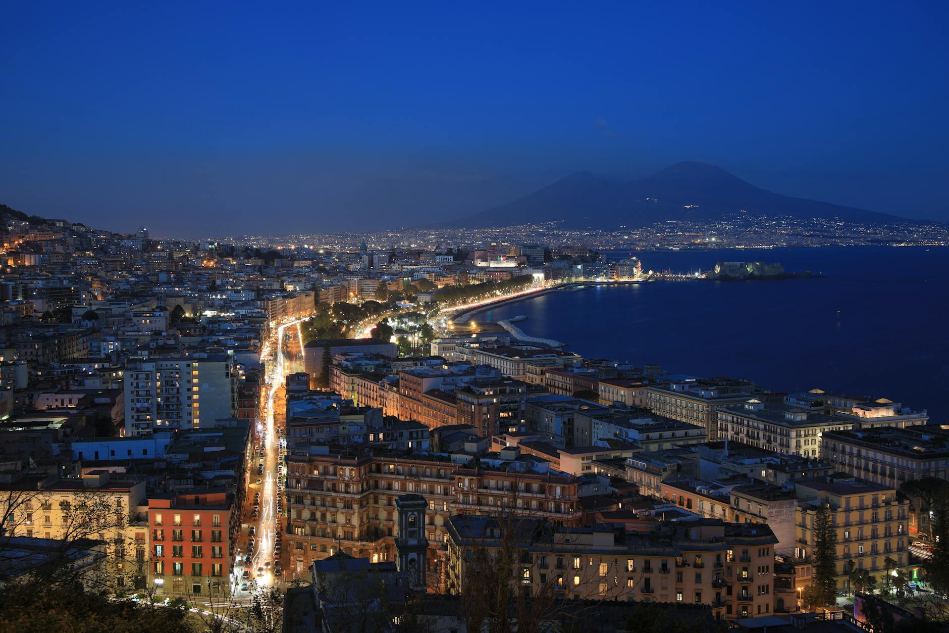 Aerial view of Naples and Mount Vesuvius under evening lights