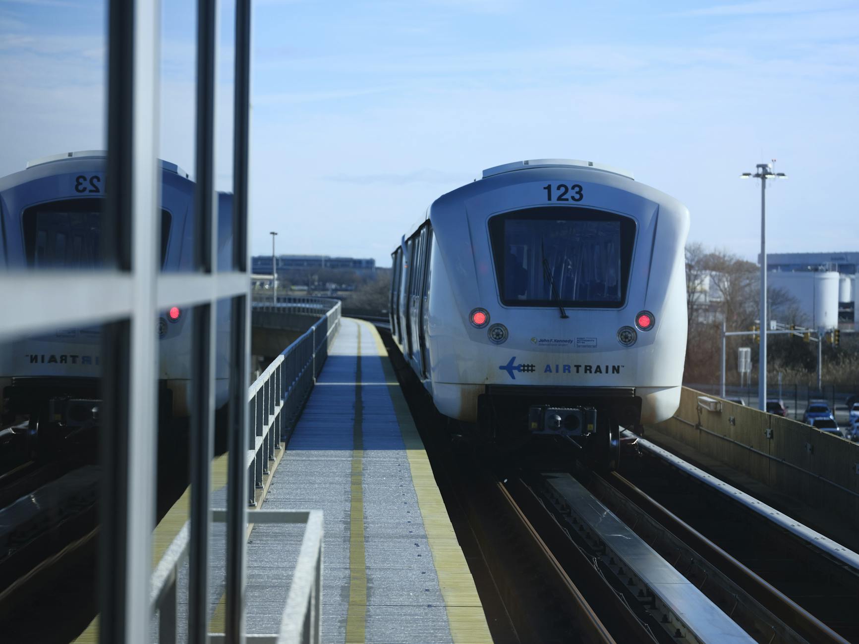 Airport train arriving at a station platform