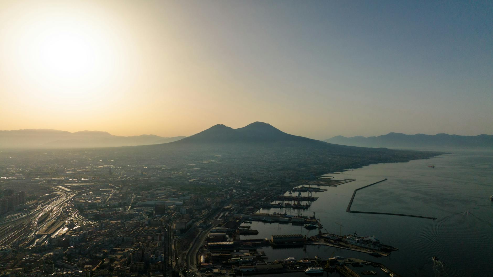 Mount Vesuvius at sunrise above Naples and the coast