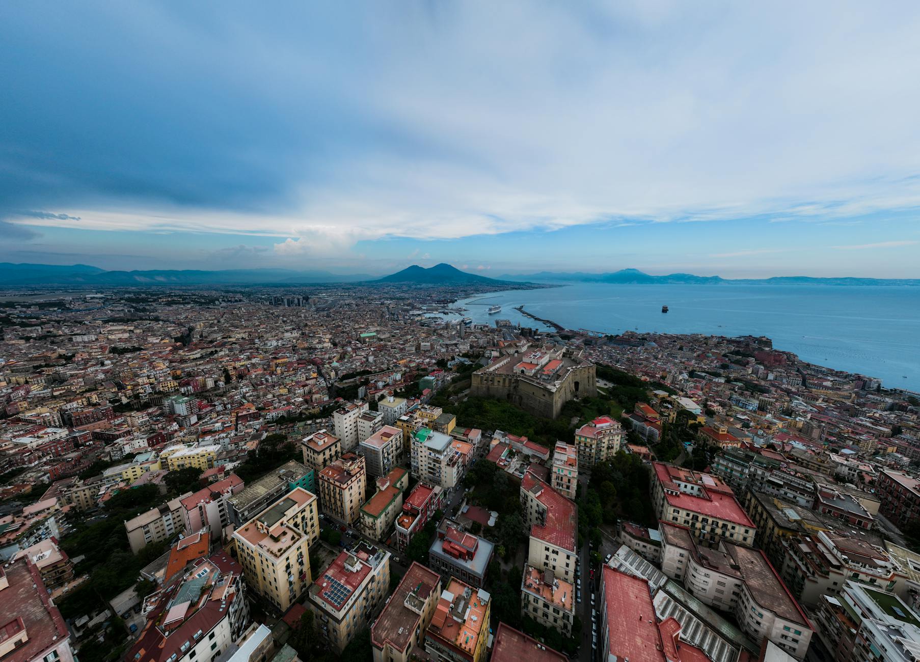 Panoramic aerial view of Naples, Mount Vesuvius, and the Mediterranean Sea