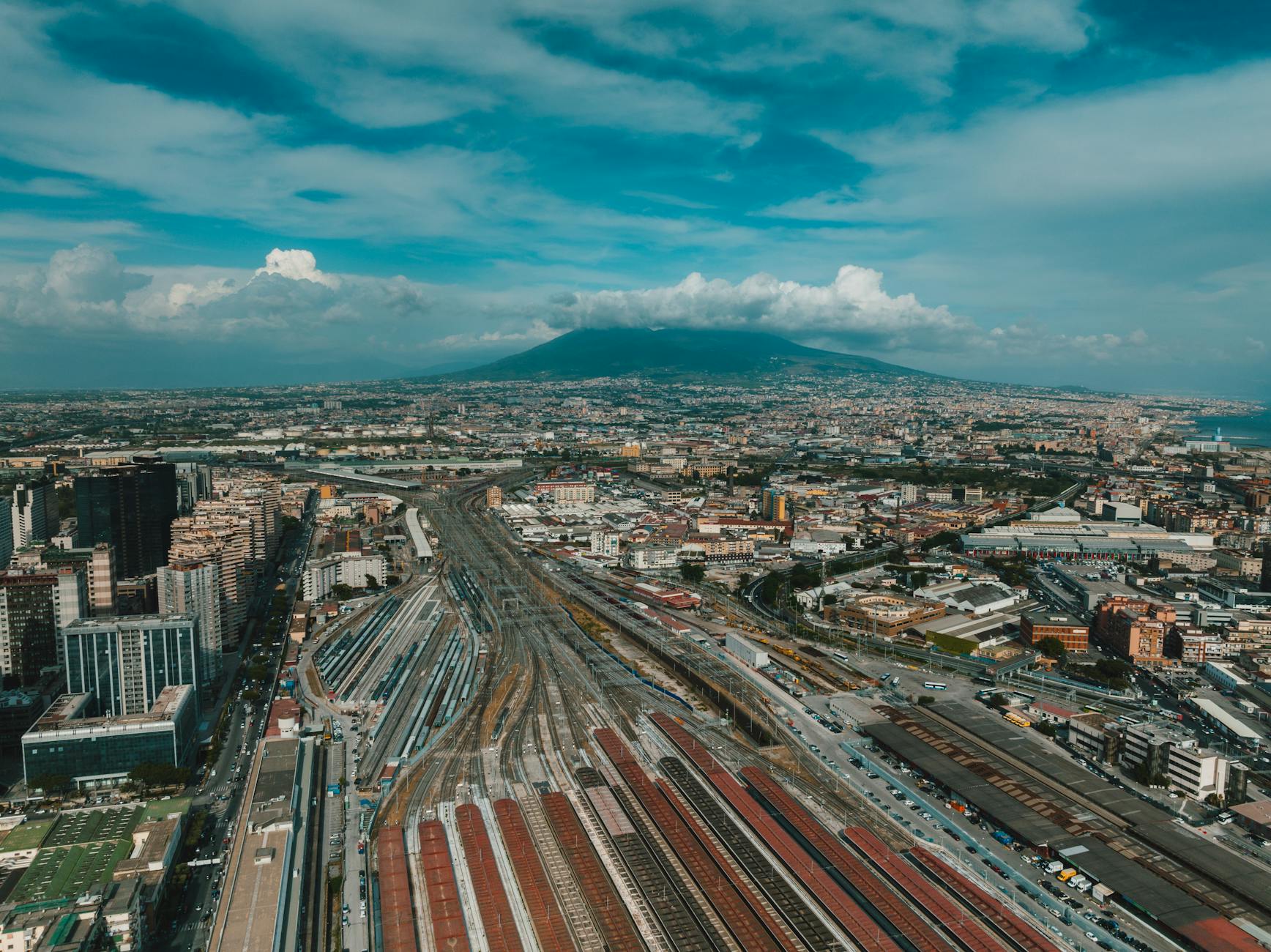Aerial view of Naples rail lines with Mount Vesuvius in the distance