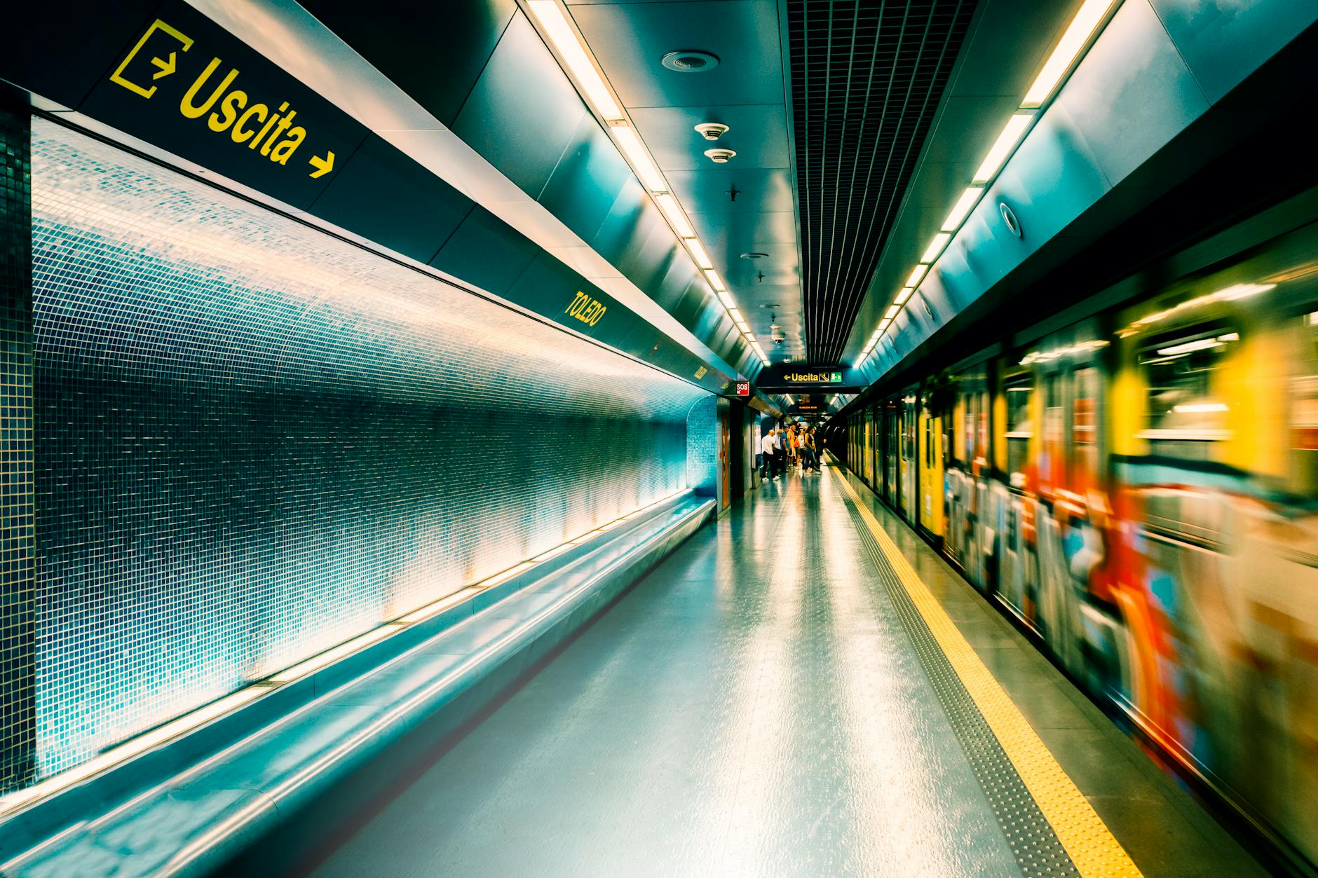 Subway station in Napoli with a moving train