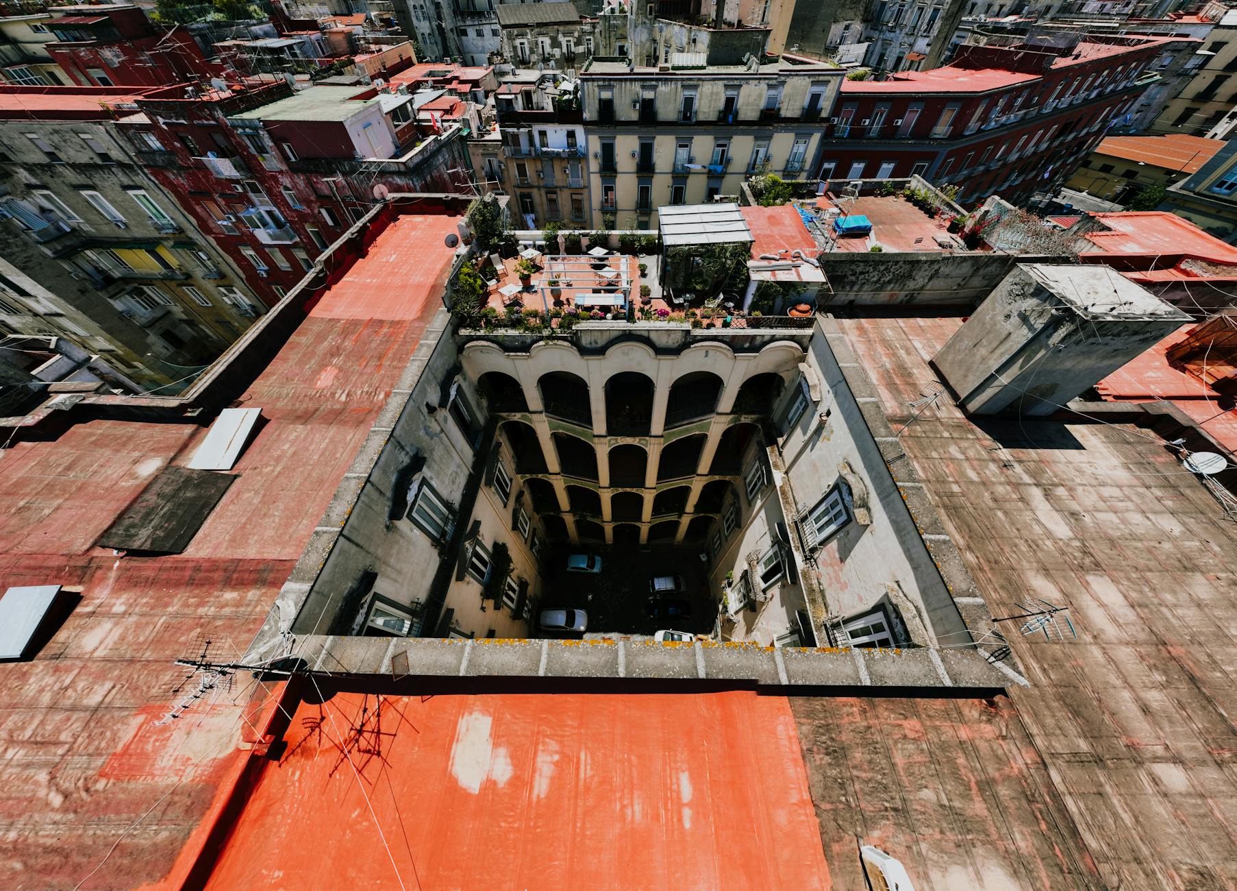 Aerial view of a rooftop courtyard in Naples