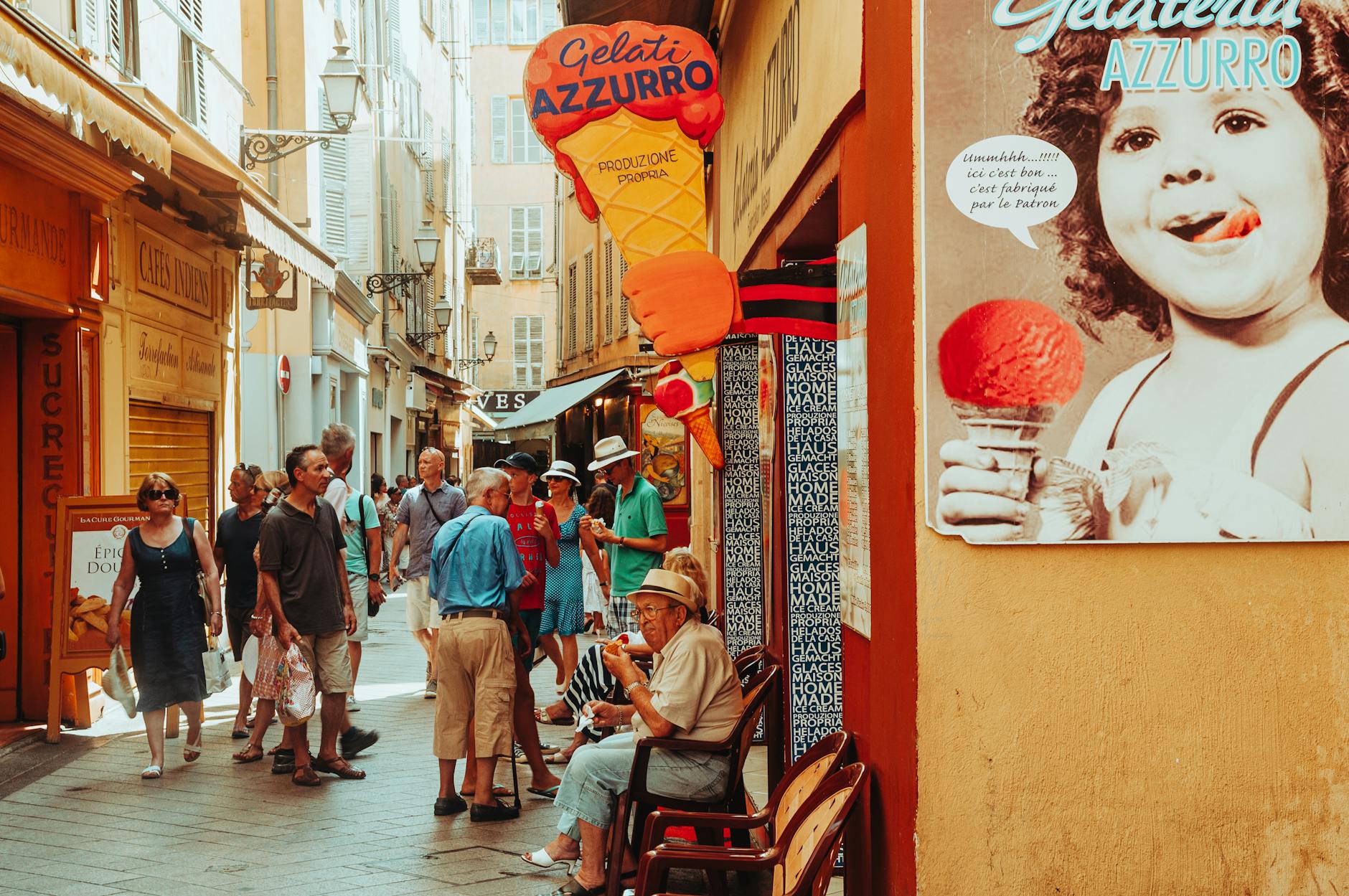 French alley market with shops and a gelato stand