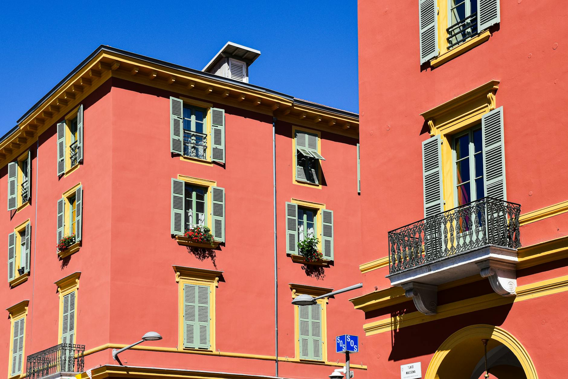 Red buildings with shutters in Nice