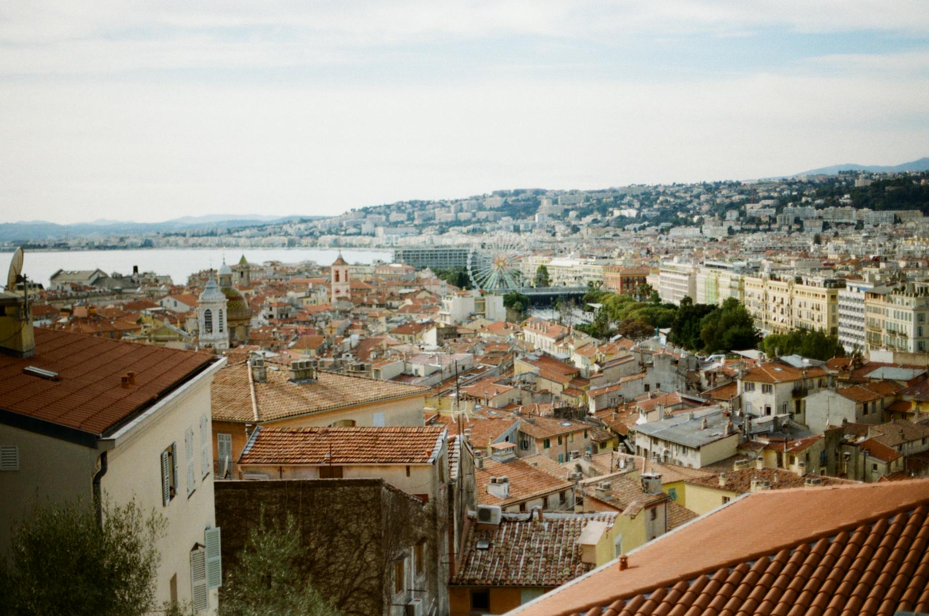 Aerial view of Nice rooftops and Mediterranean coastline