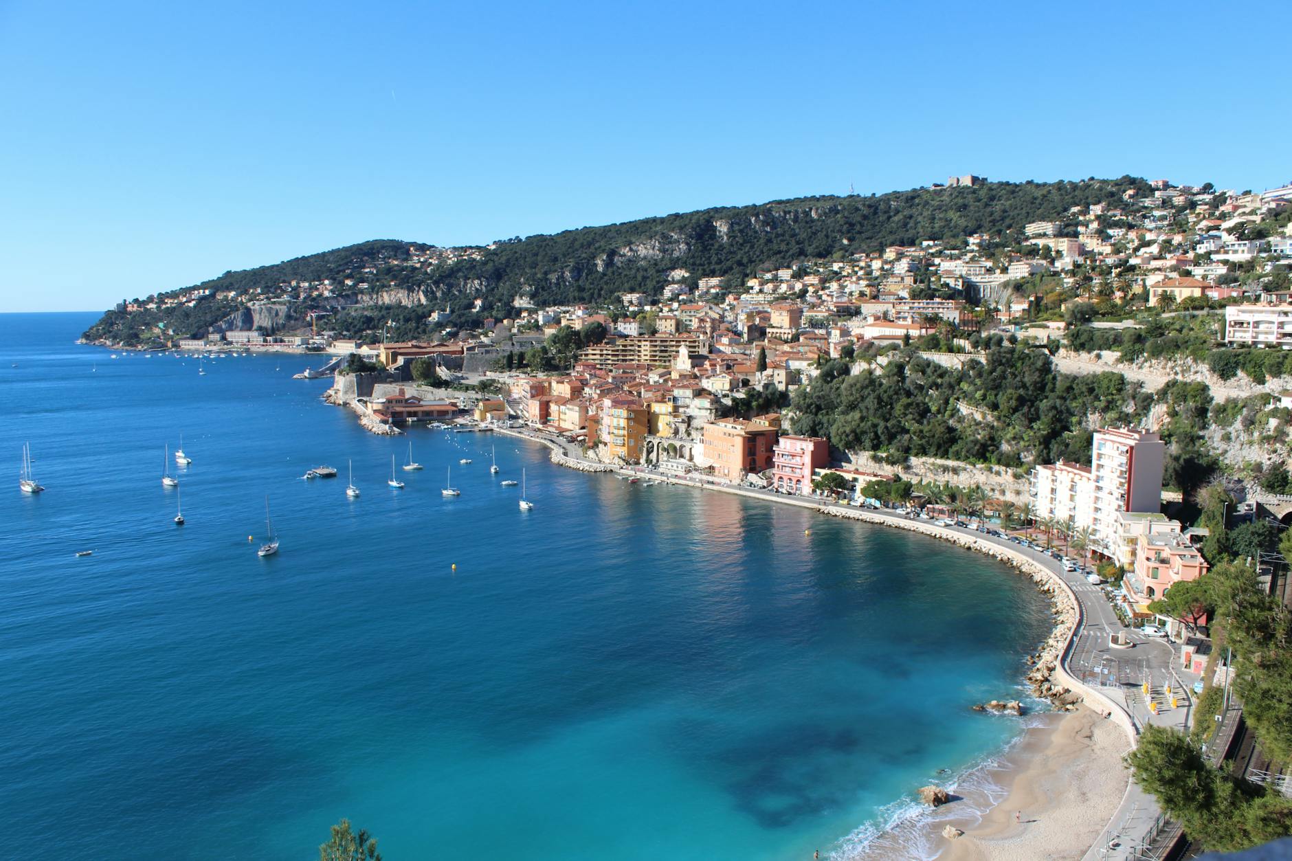 Villefranche-sur-Mer coastline and boats on a clear day