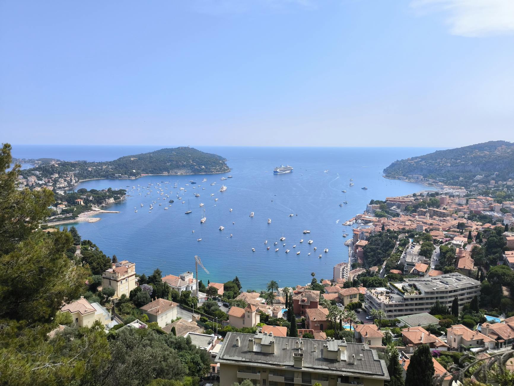 Villefranche-sur-Mer bay with boats and a cruise ship