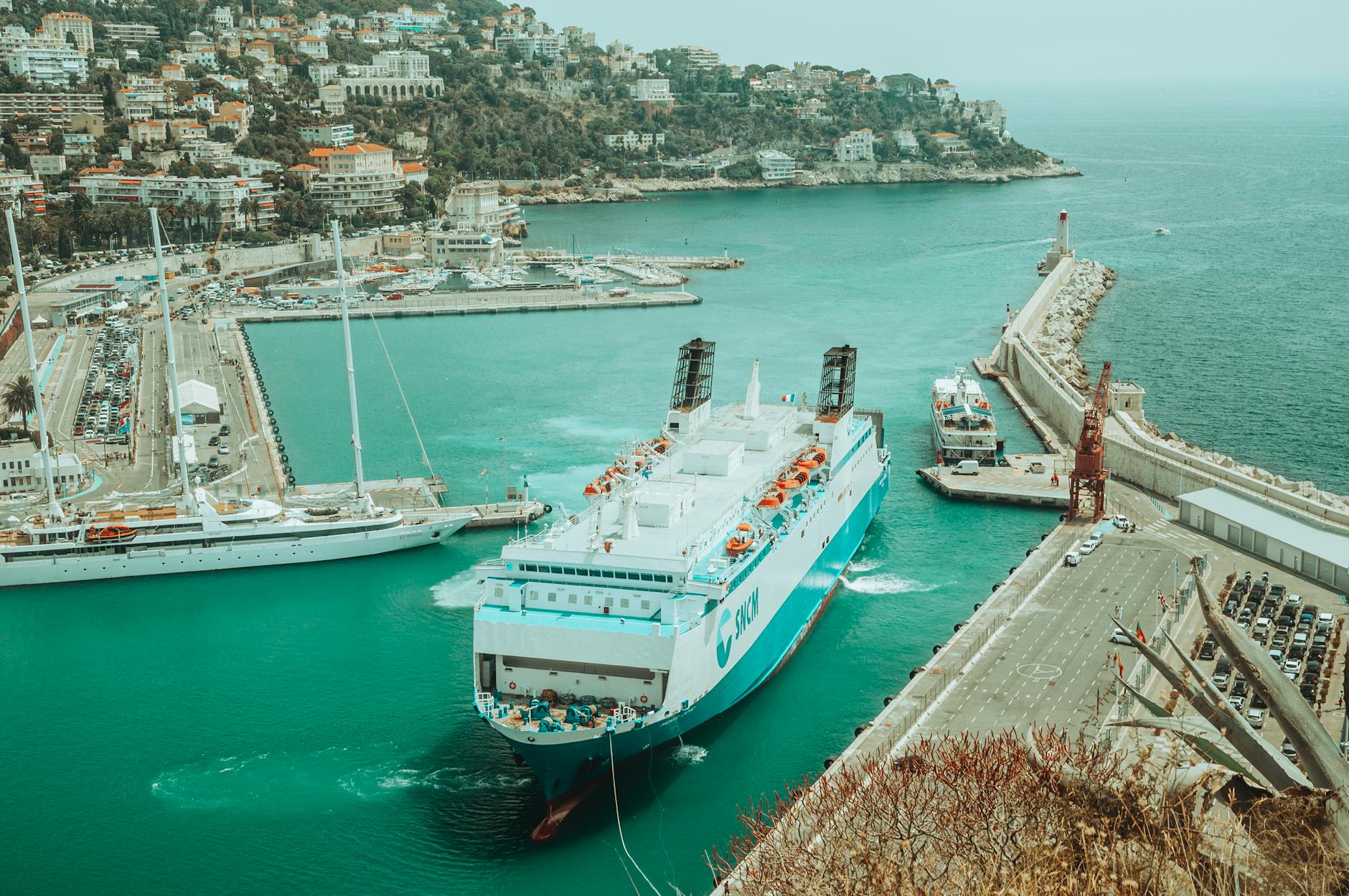 Cruise ship near a coastal harbor on the French Riviera