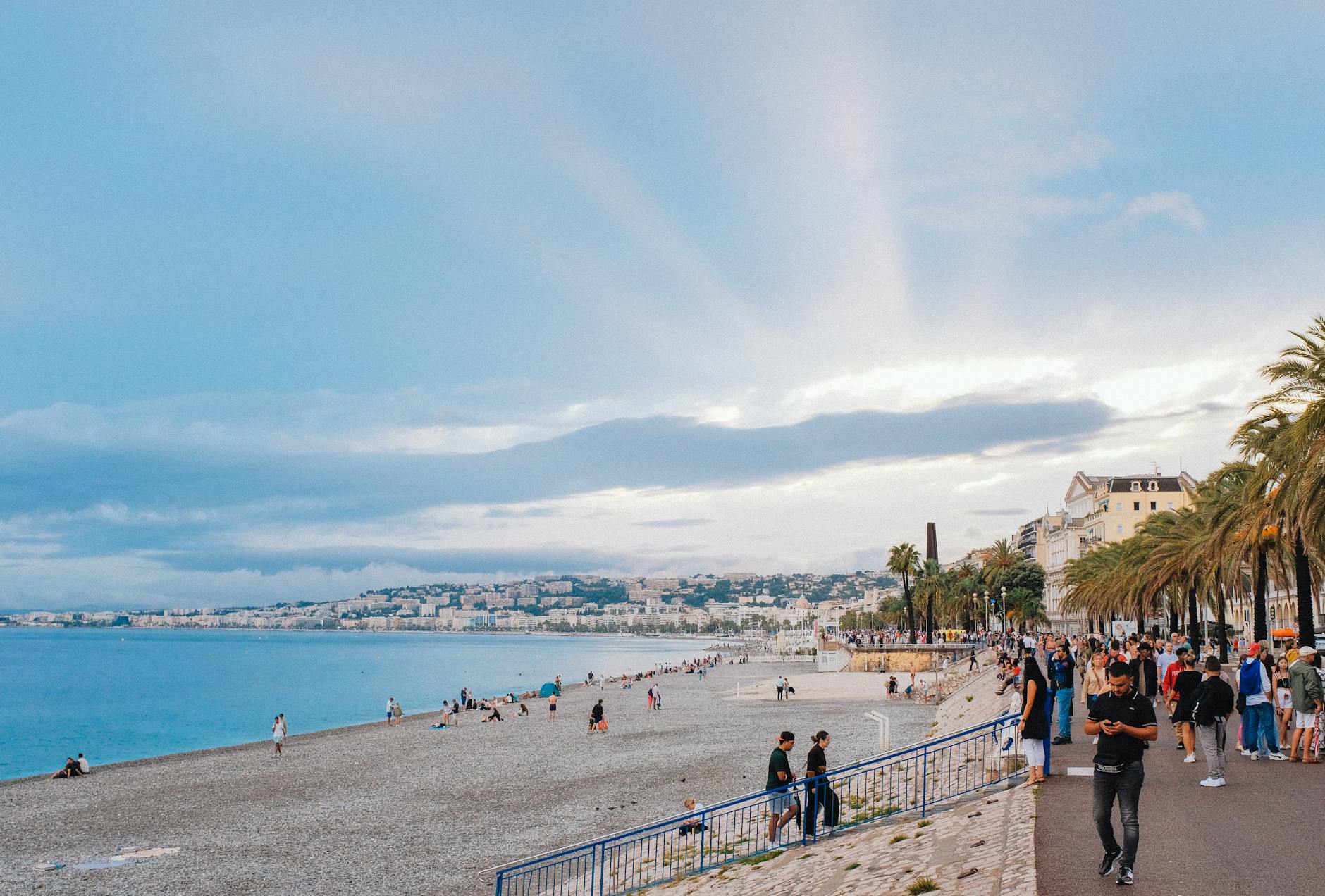 Bustling Nice beachfront and palm-lined promenade