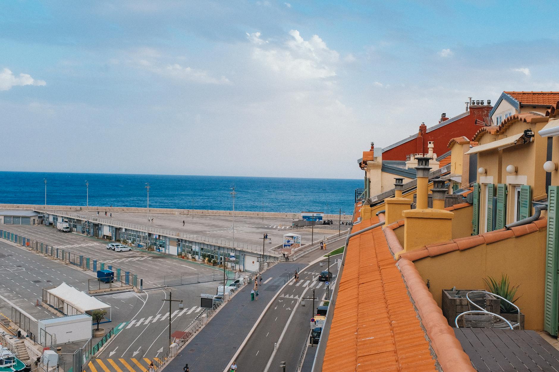 Mediterranean city rooftops and blue sea near Nice
