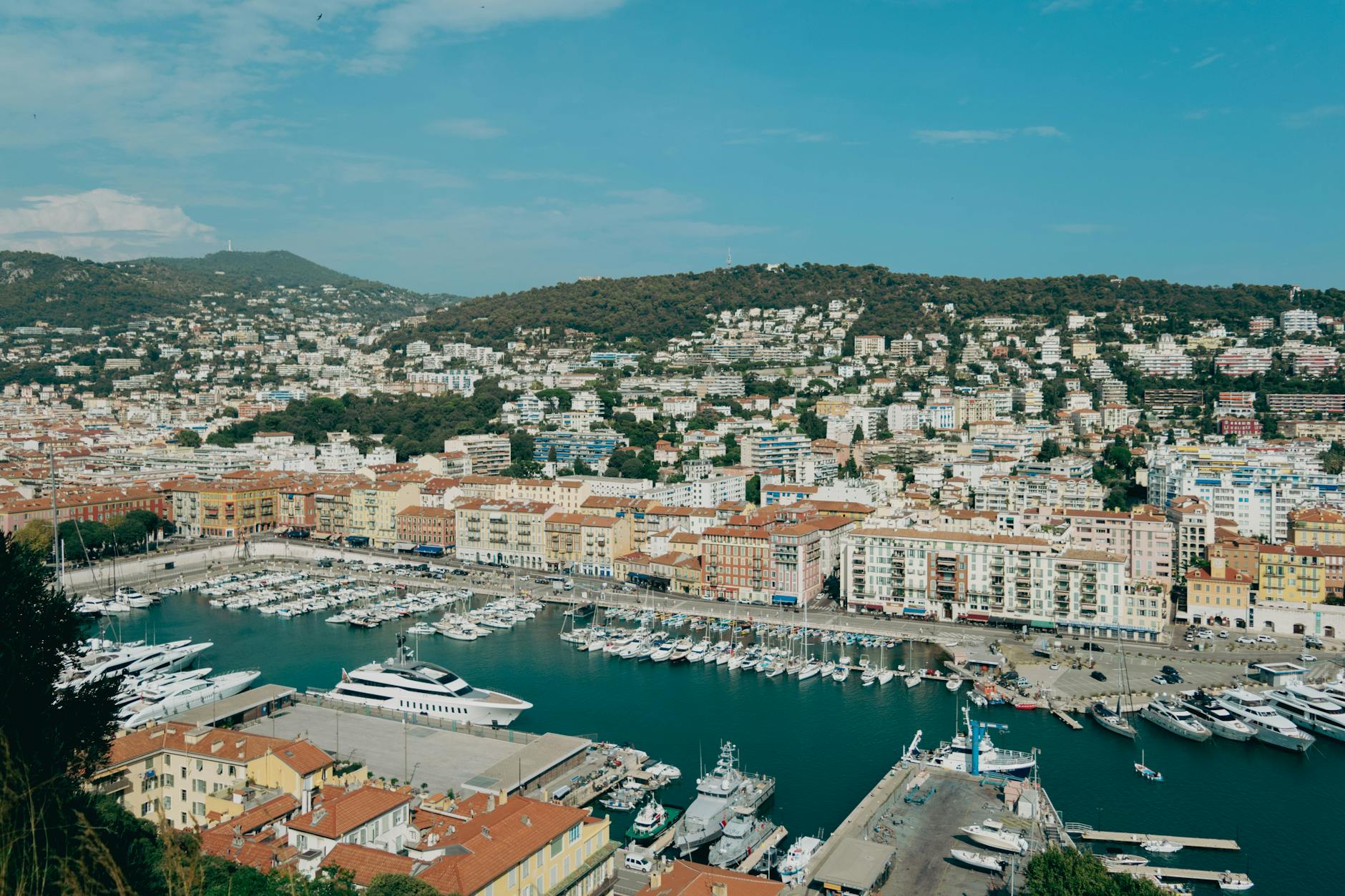 Aerial view of Nice harbor and hillside architecture