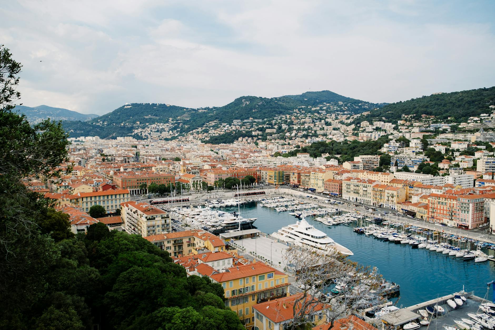 Aerial view of Nice harbor with yachts and cityscape