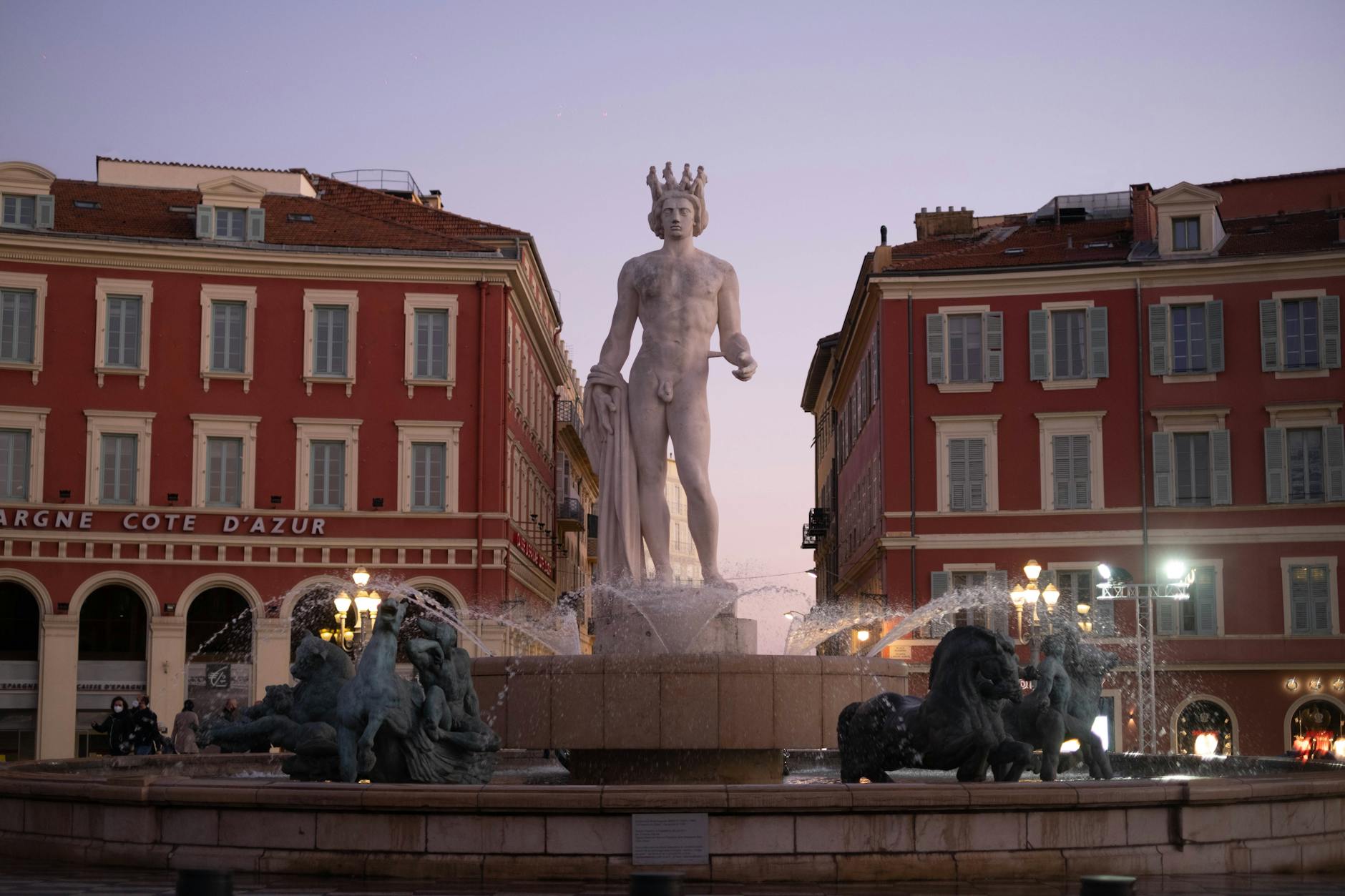 Fontaine du Soleil in Nice at twilight in Place Massena