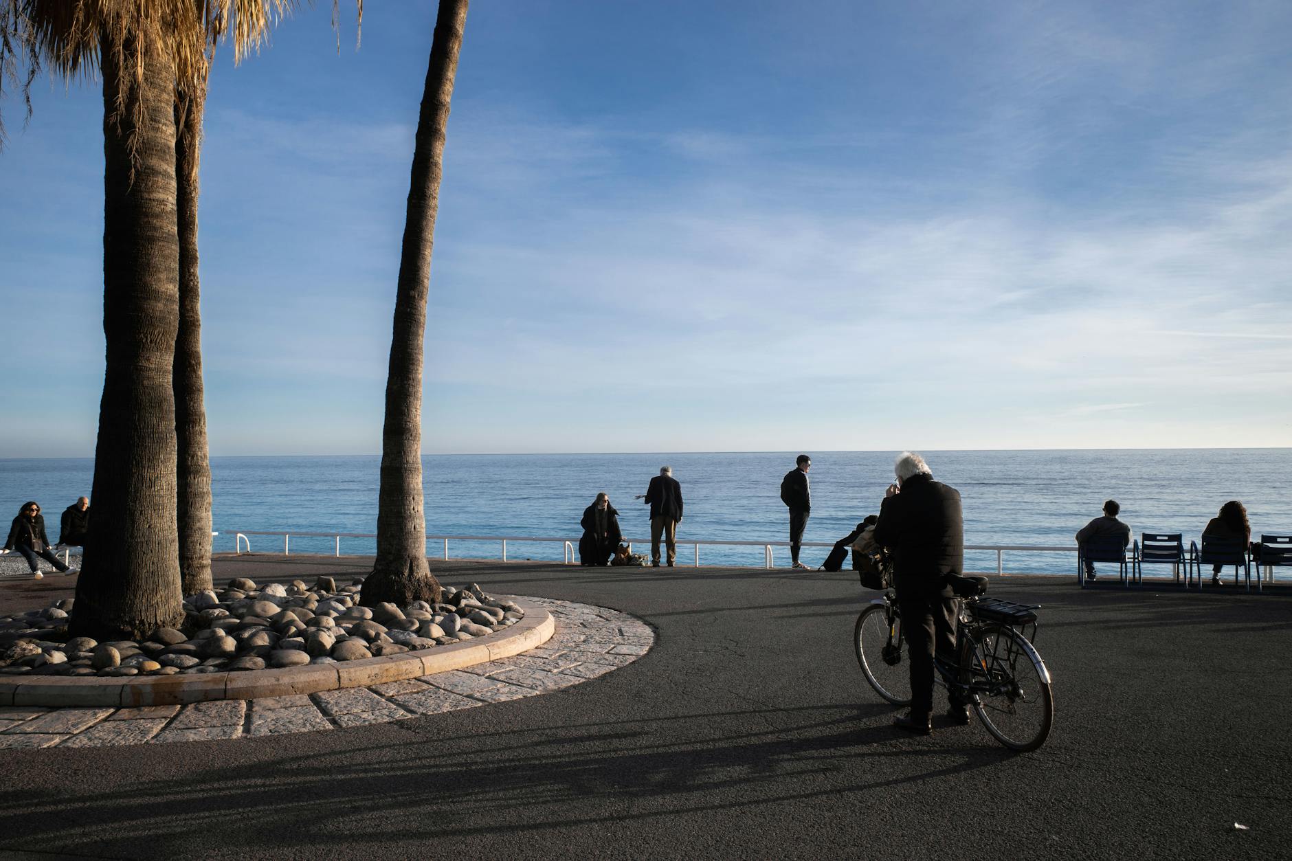 People relaxing on the Promenade des Anglais