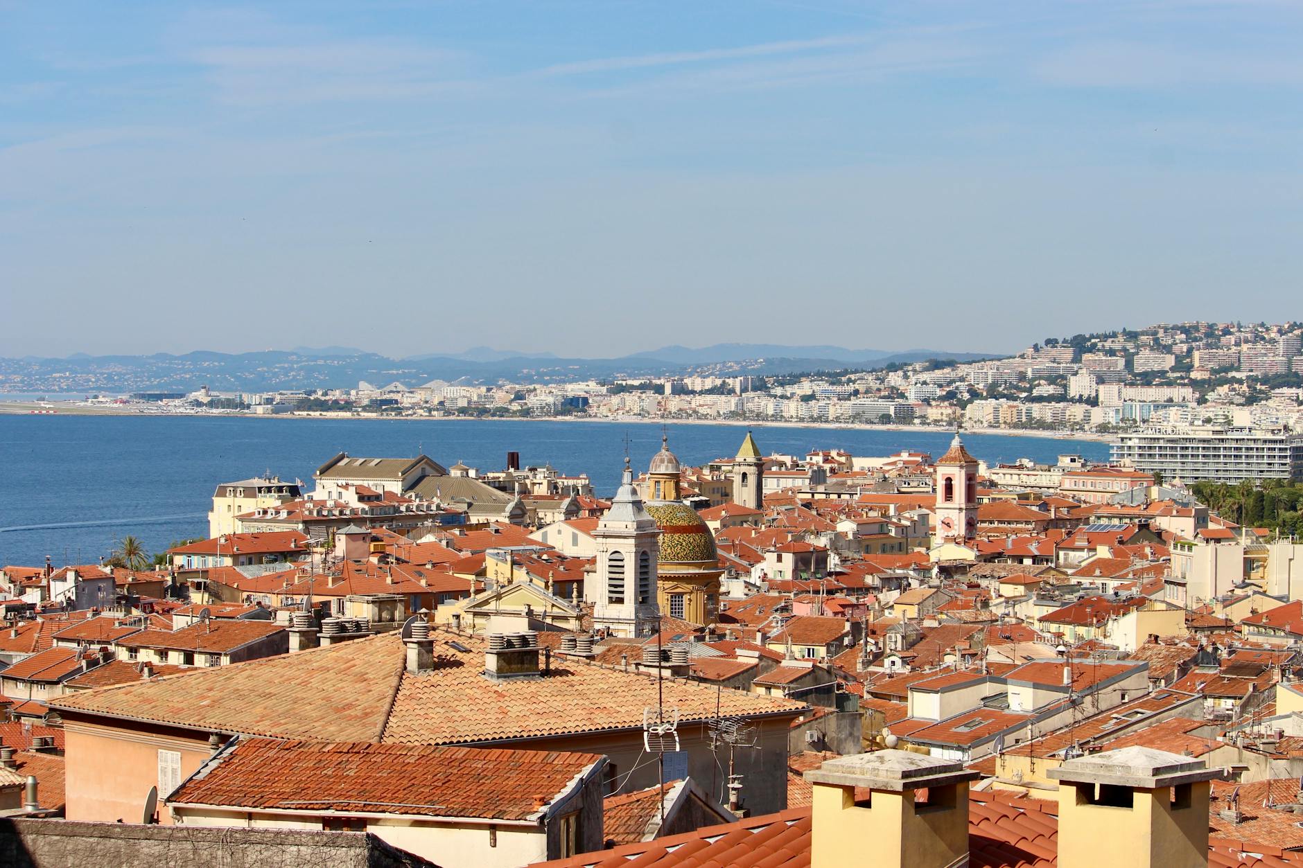 Aerial view over Nice rooftops and the Mediterranean Sea