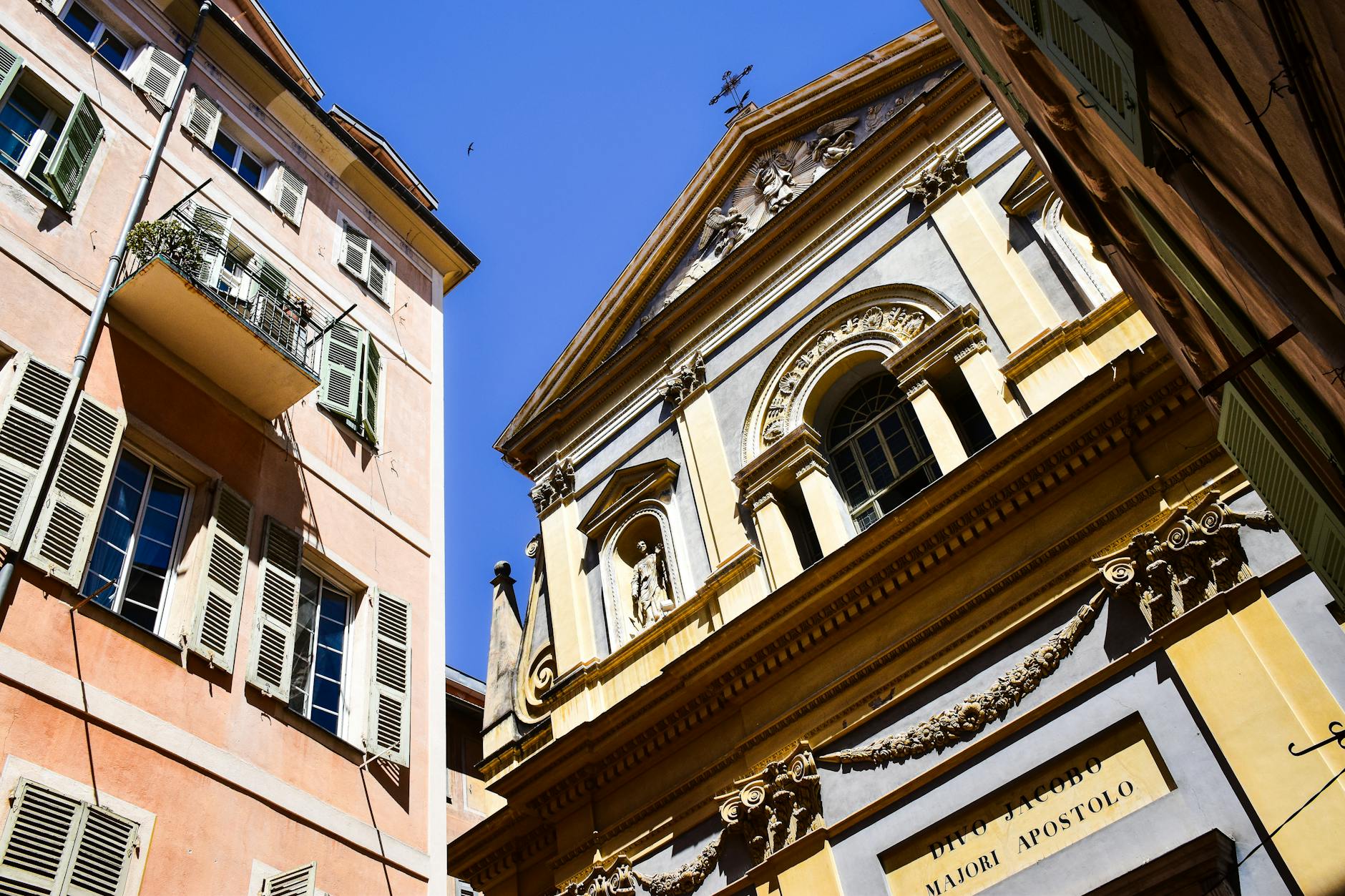 Historic architectural details in Nice under a clear sky