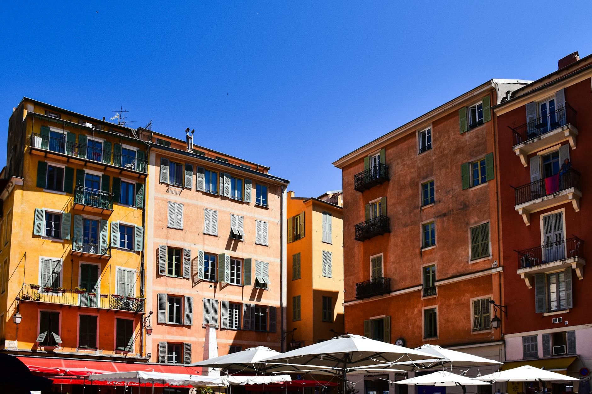 Colorful facades in Nice under clear sky
