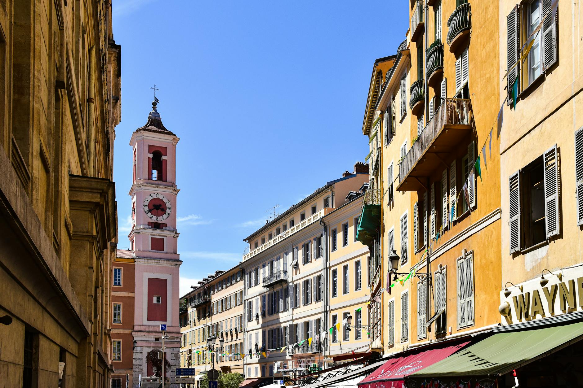 Colorful buildings and bell tower in Old Nice