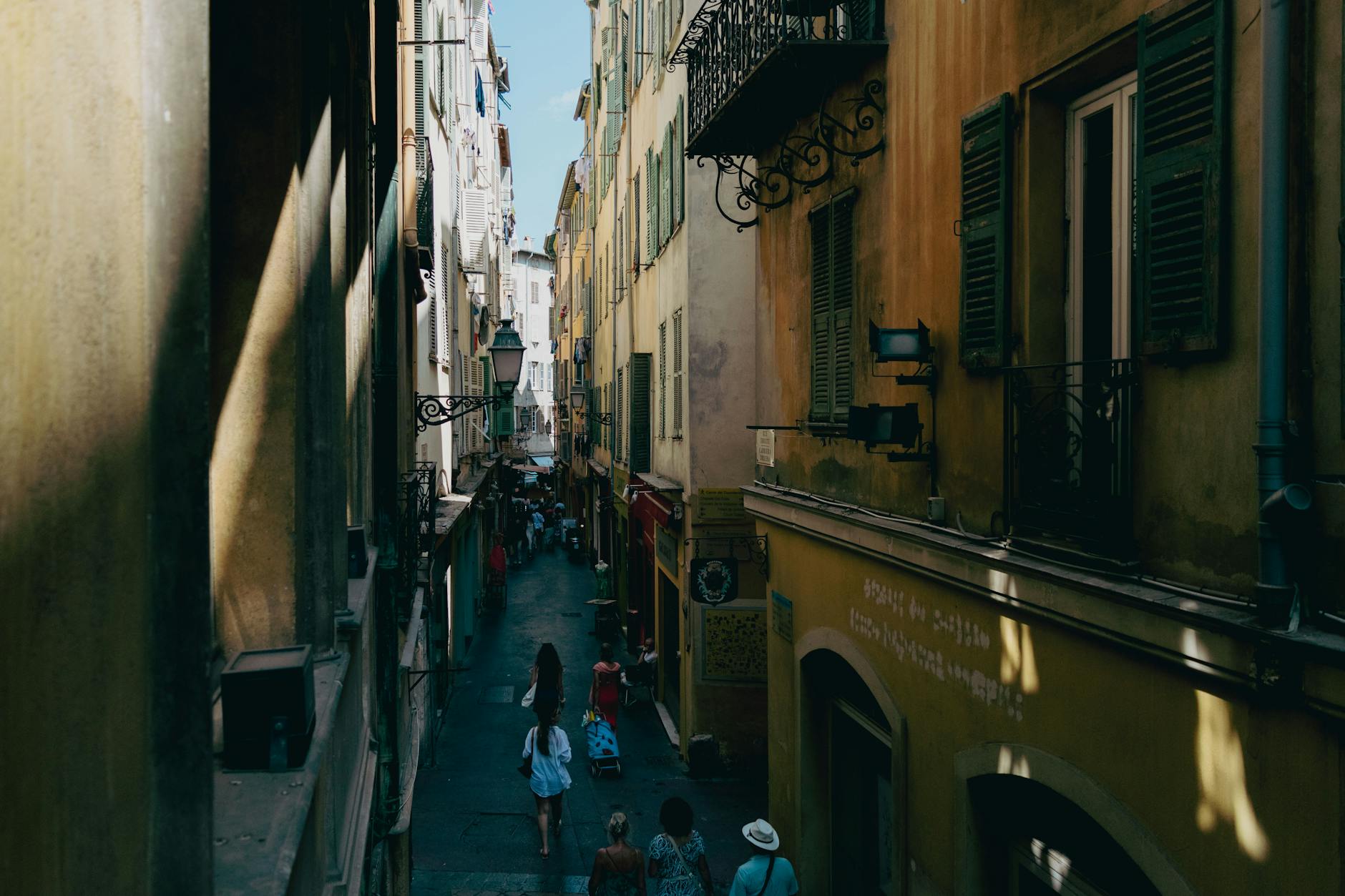 Historic street in Nice with lively architecture