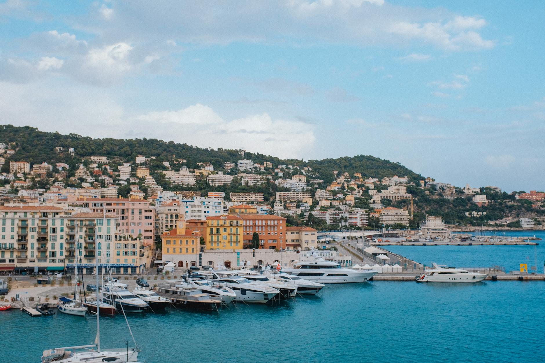 Nice harbor with yachts and colorful Mediterranean buildings