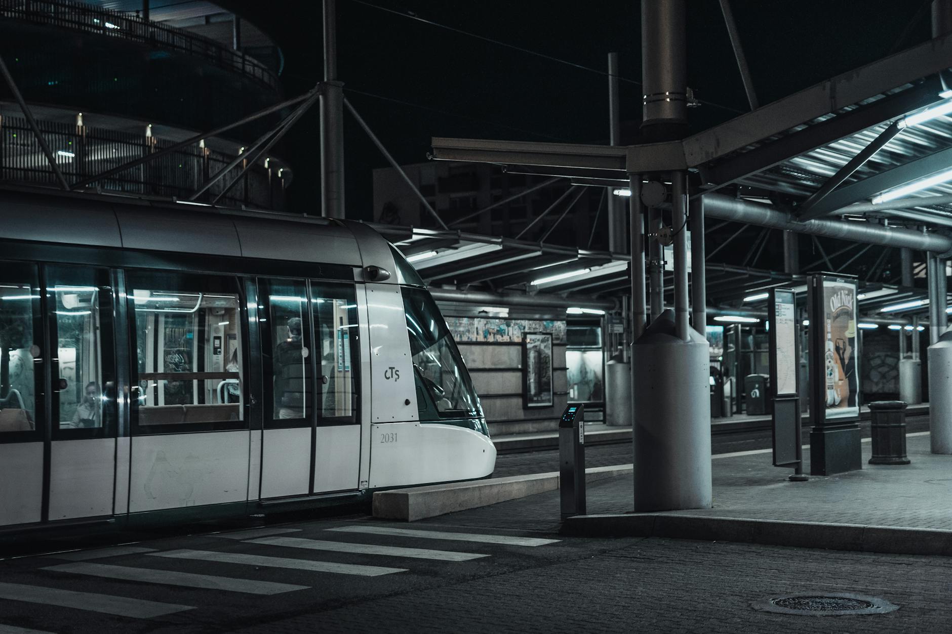 Modern tram station at night in France