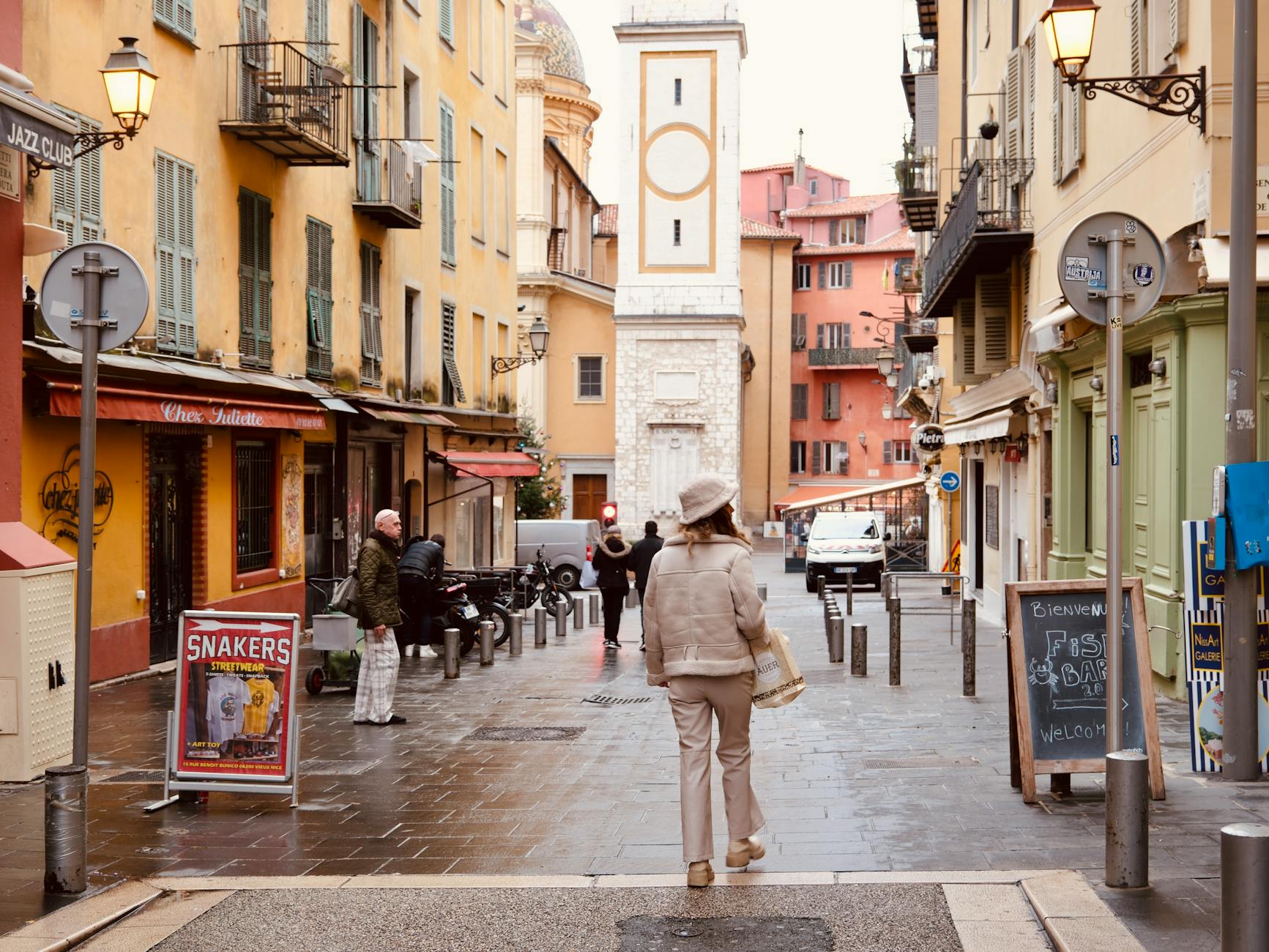 Quaint street in Old Nice with colorful buildings