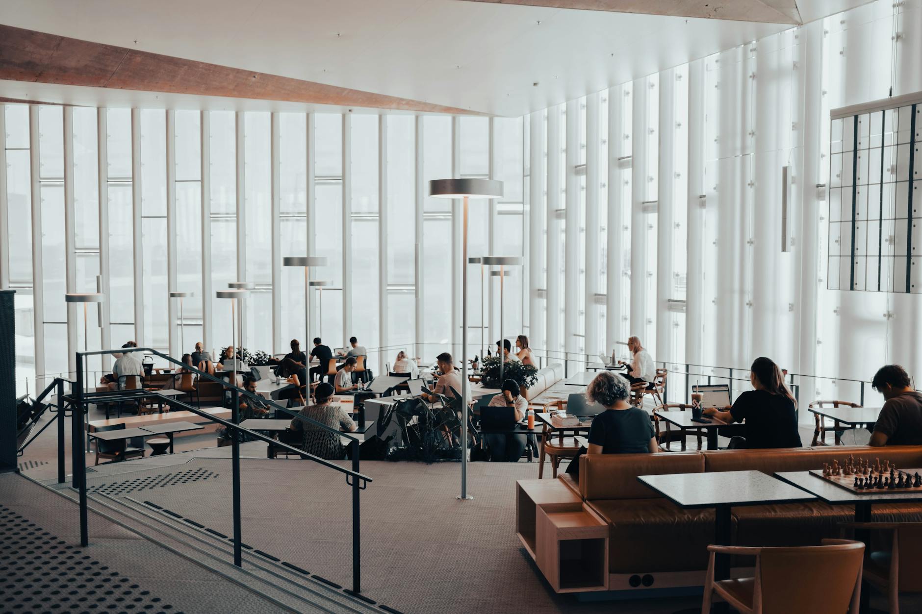 People reading and studying inside Oslo public library