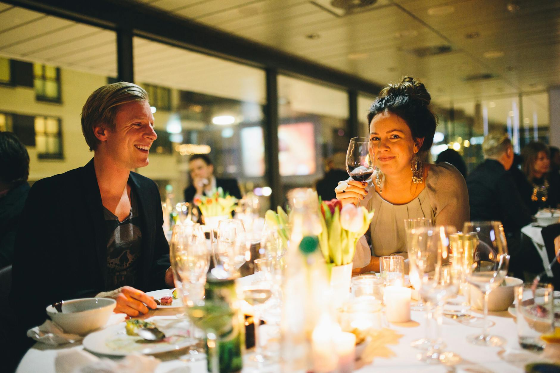 Dinner gathering in Oslo with warm indoor atmosphere