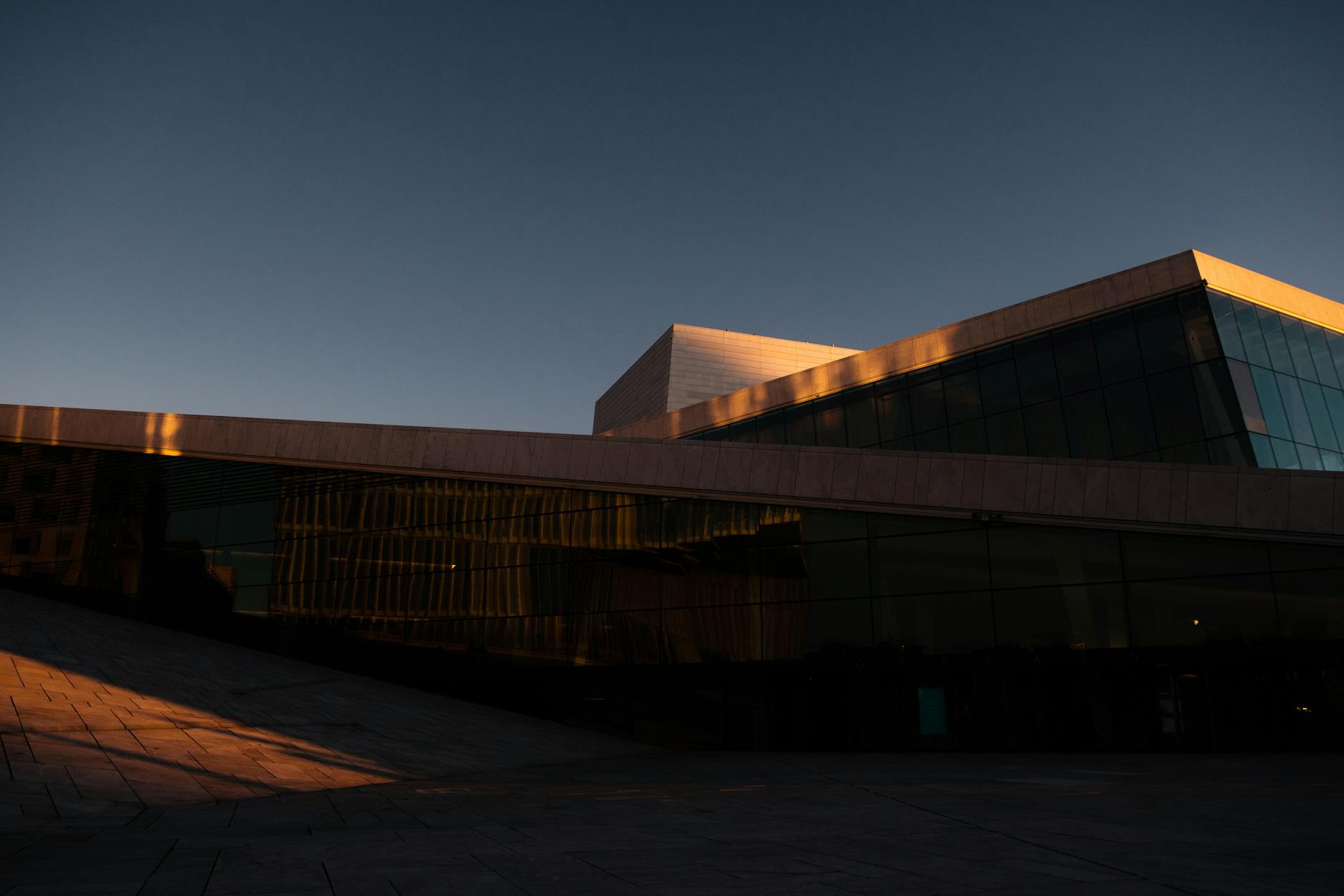 Modern Oslo Opera House facade at dusk