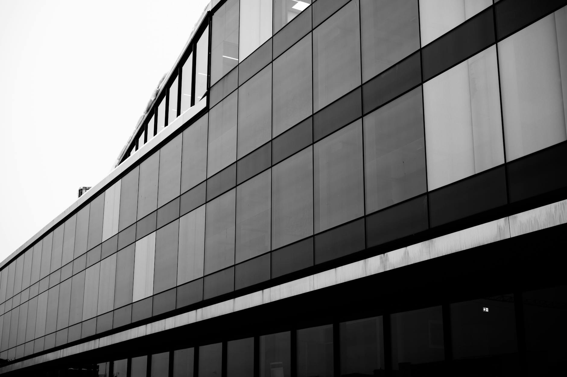 Modern glass building in Oslo with sleek architectural lines
