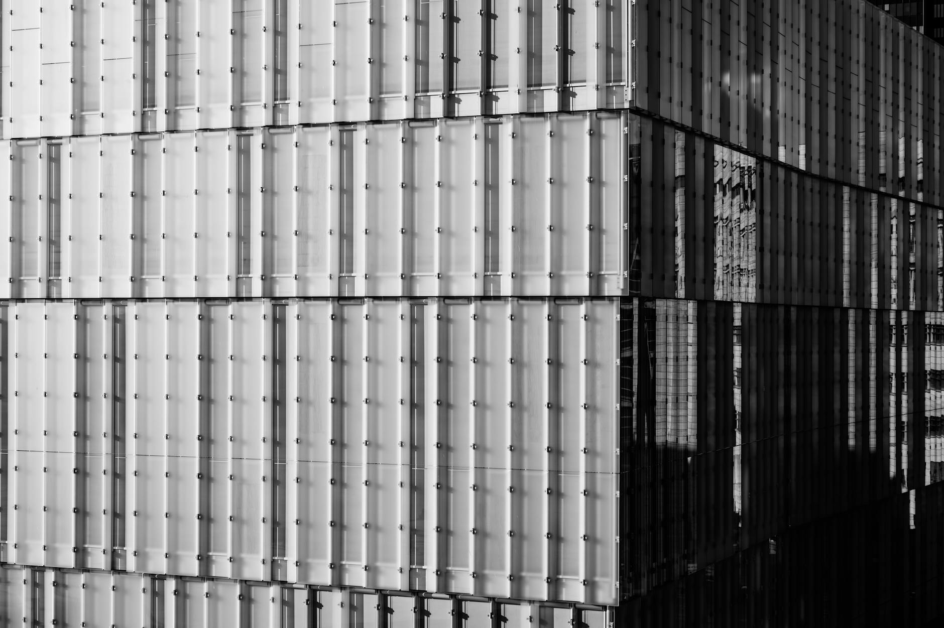 Black and white modern glass building facade in Oslo