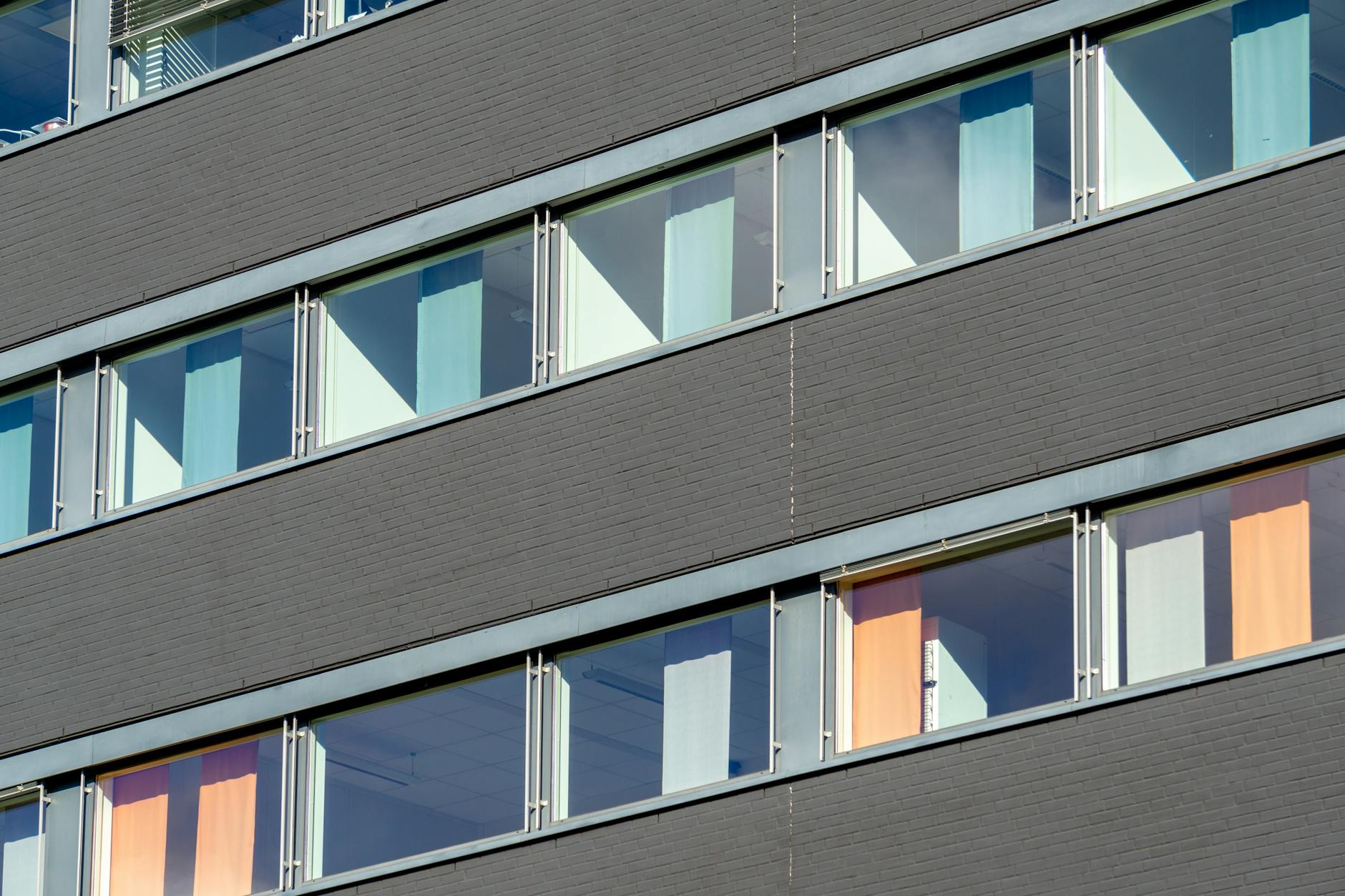 Modern Oslo building facade with colored windows