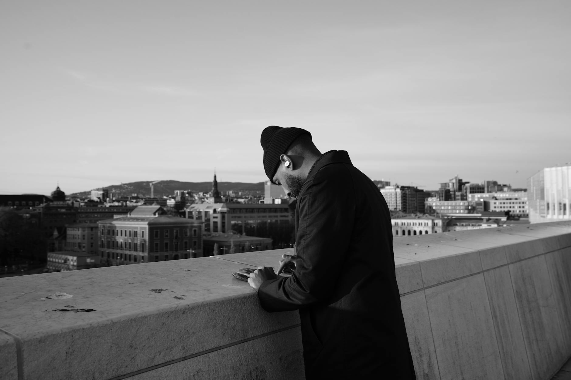 Person overlooking Oslo cityscape