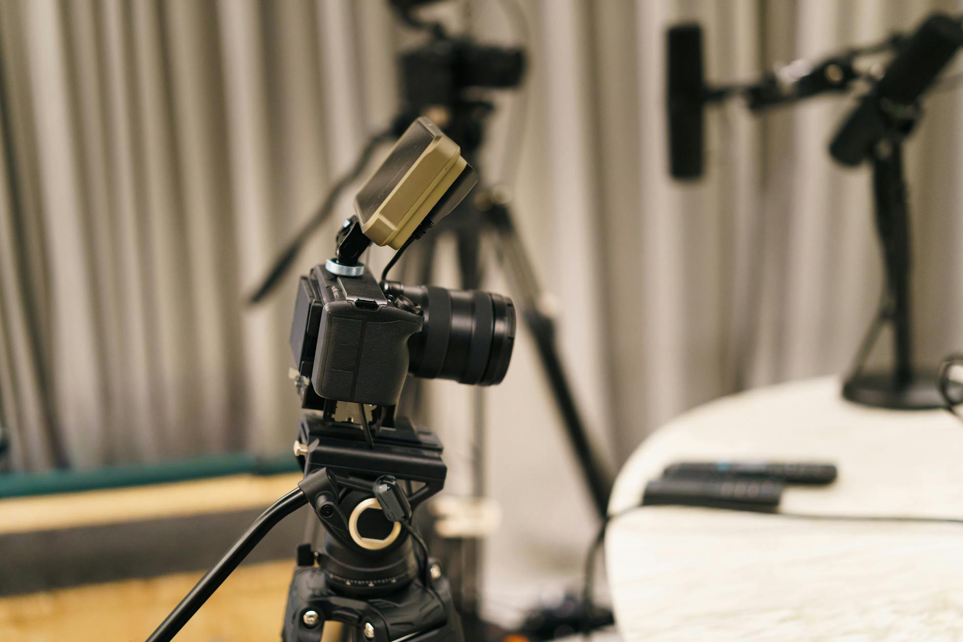 Camera and microphone in a professional podcast studio