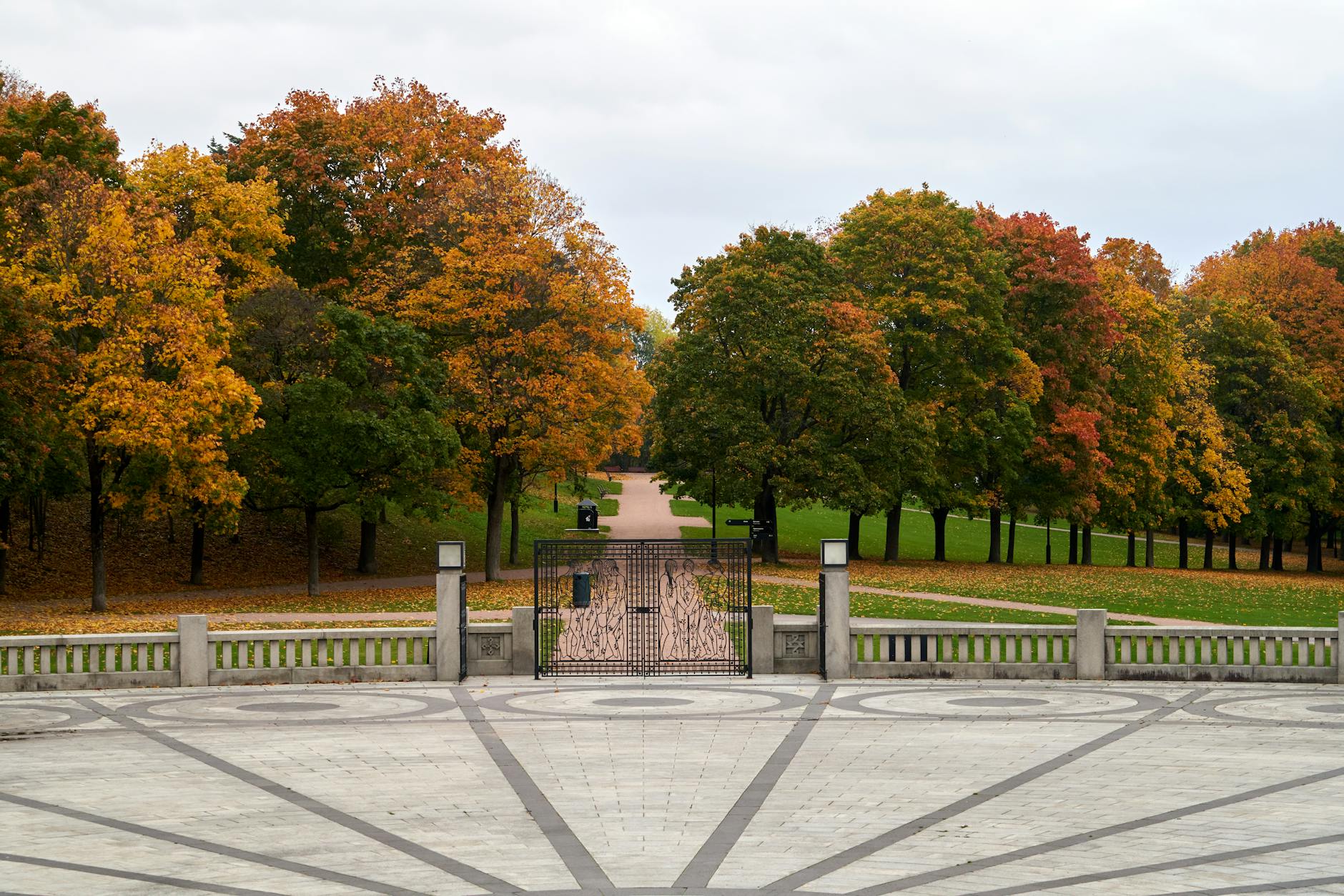 Autumn trees lining a pathway in Frogner Park