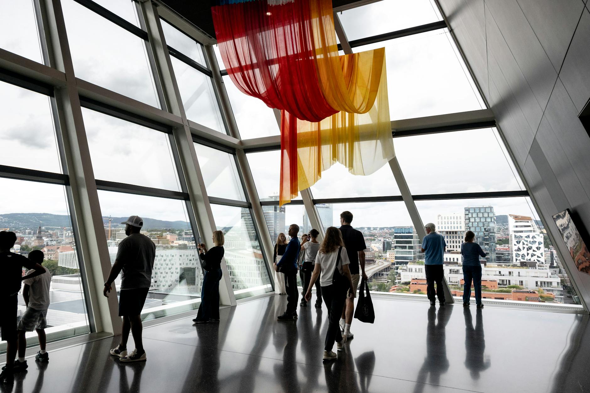 Modern art display in an Oslo museum with city views