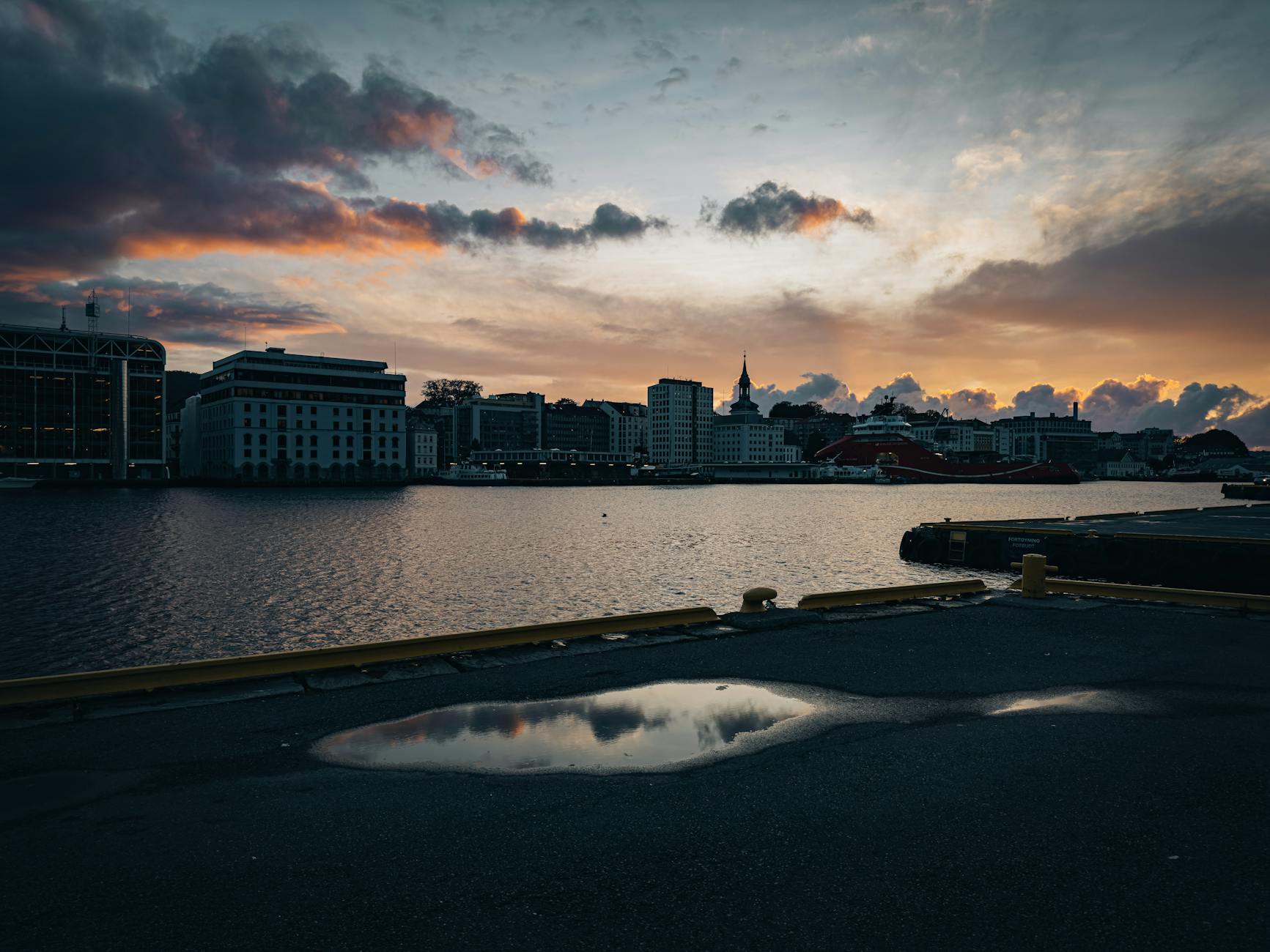 Oslo skyline reflected on the water at sunset
