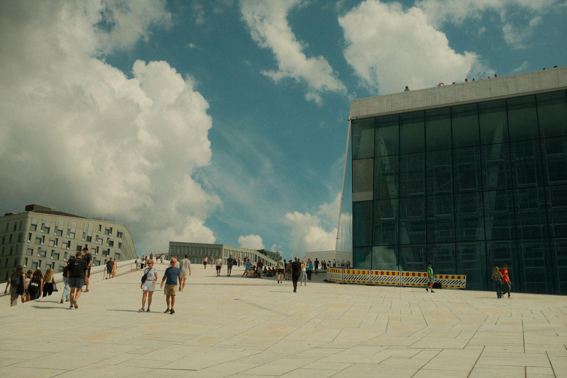 Visitors at Oslo Opera House on a sunny day